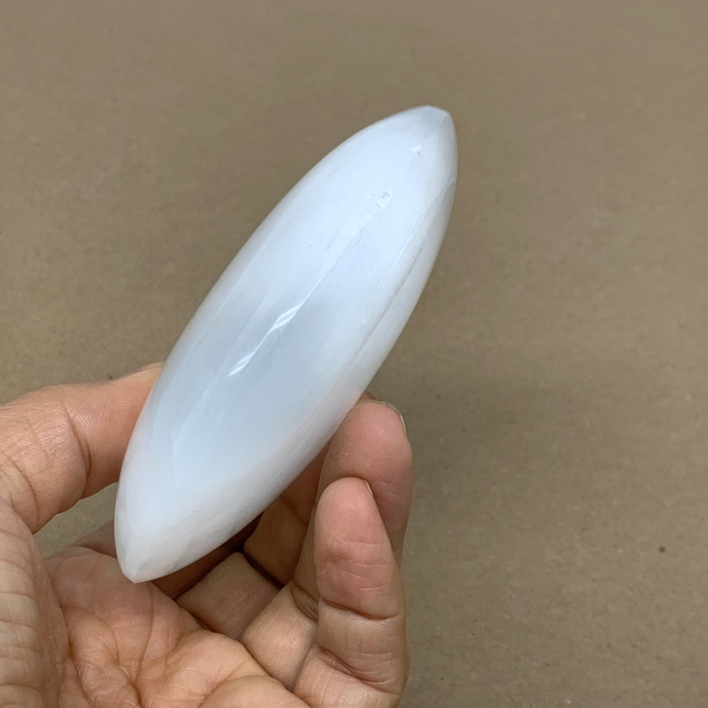 0.62 lbs, 3.9"x3.1"x1.2", White Selenite Palmstone Crystal Pillow Reiki, B36097