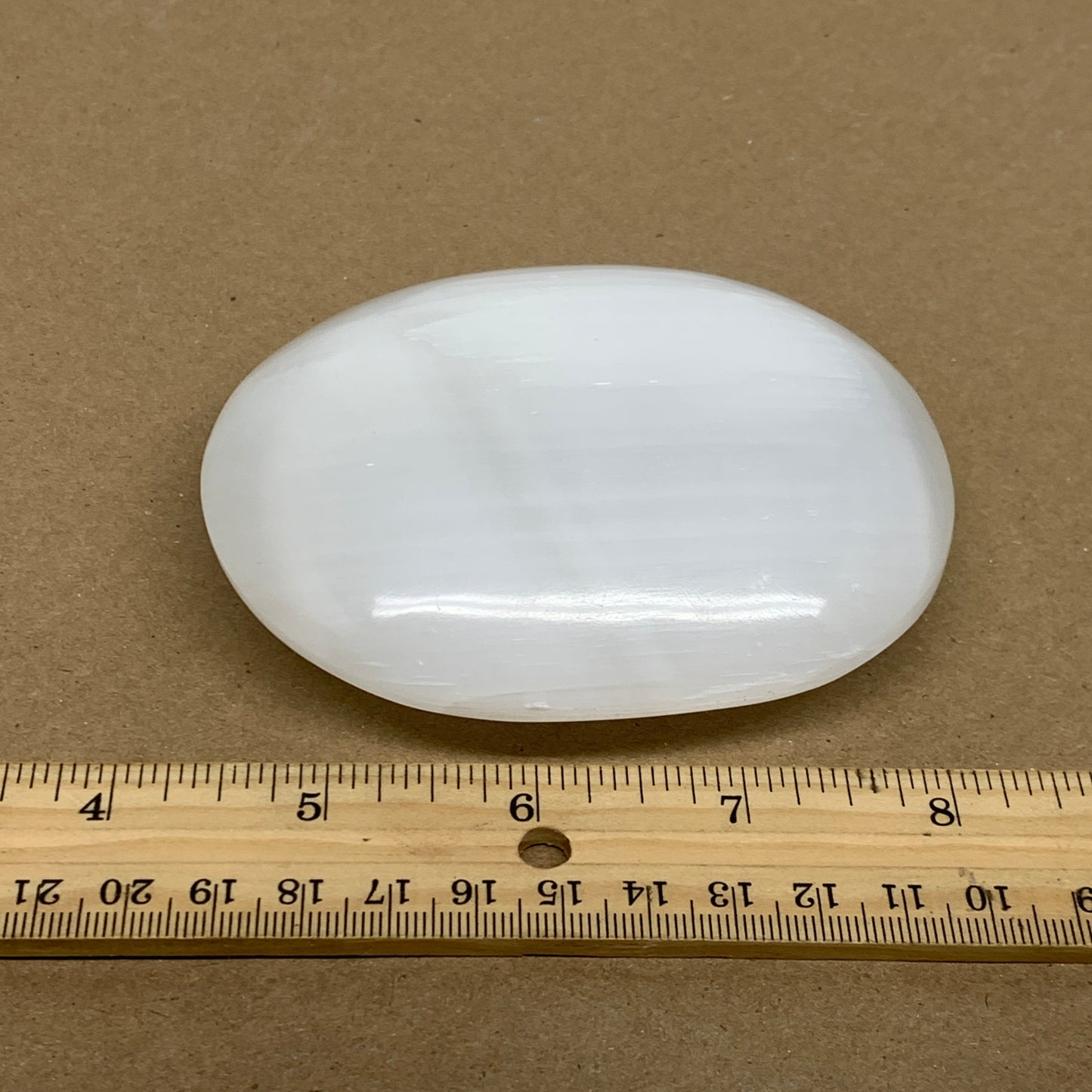 0.62 lbs, 3.9"x3.1"x1.2", White Selenite Palmstone Crystal Pillow Reiki, B36097