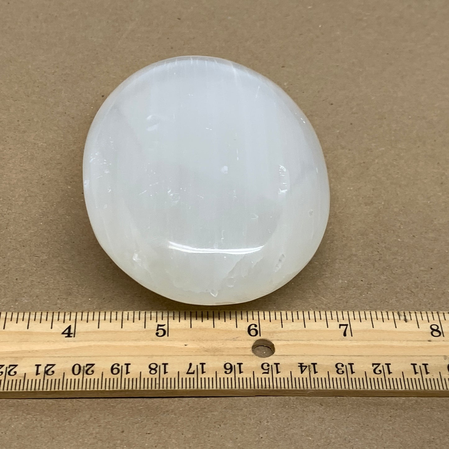 0.7 lbs, 4"x2.9"x1.4", White Selenite Palmstone Crystal Pillow Reiki, B36106