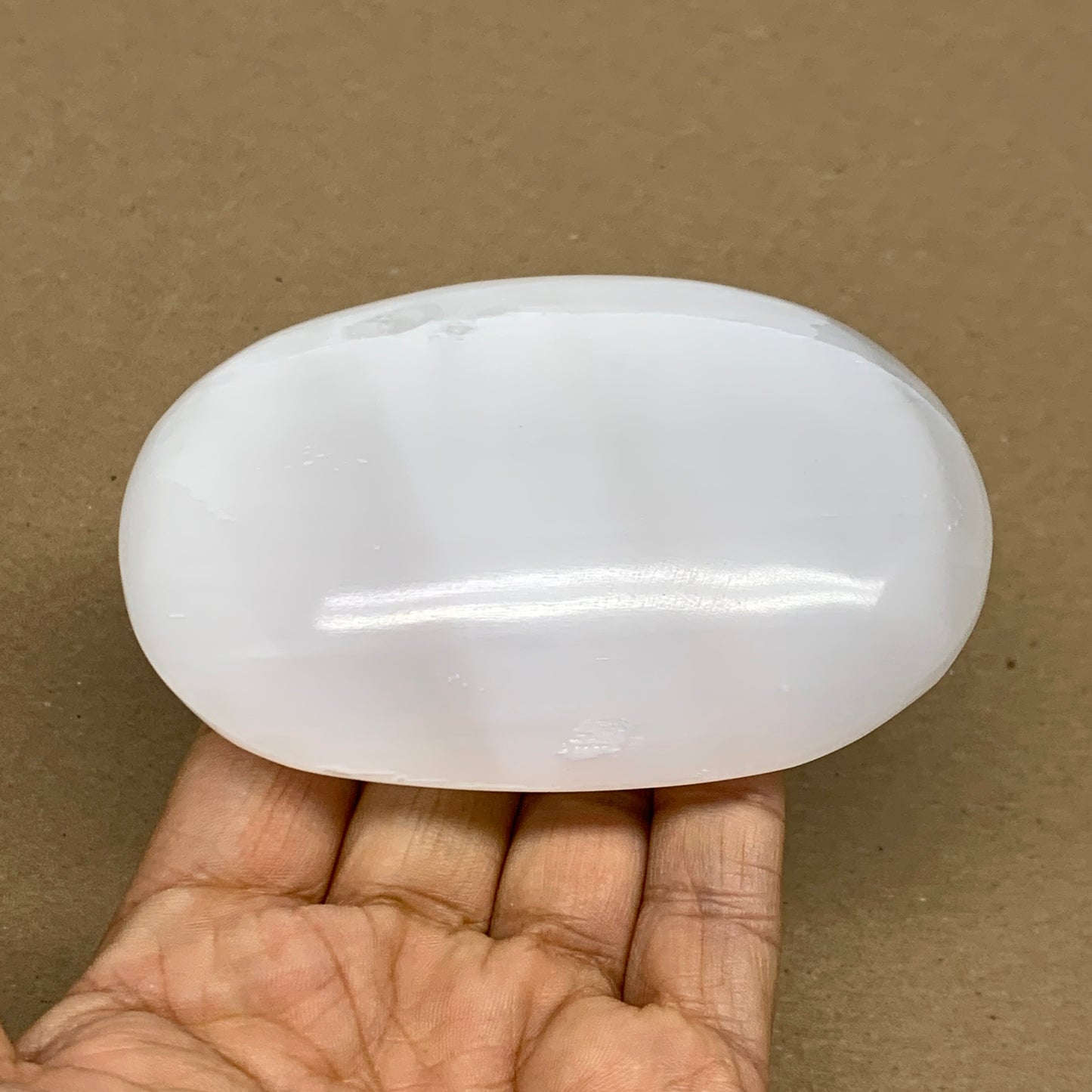 0.55 lbs, 3.9"x2.7"x1.2", White Selenite Palmstone Crystal Pillow Reiki, B36107