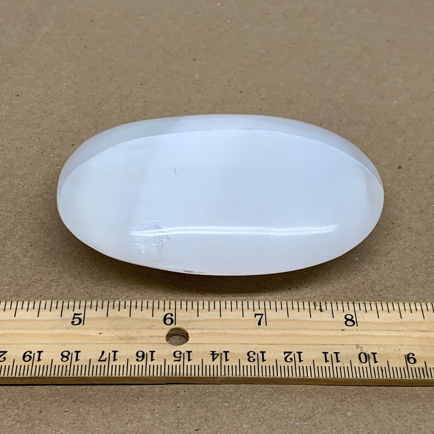 0.55 lbs, 3.9"x2.7"x1.2", White Selenite Palmstone Crystal Pillow Reiki, B36107