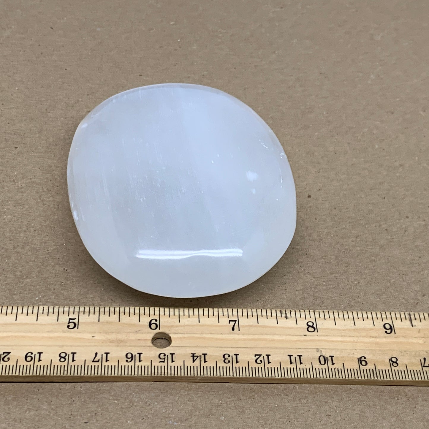 0.65 lbs, 4"x3"x1.2", White Selenite Palmstone Crystal Pillow Reiki, B36109