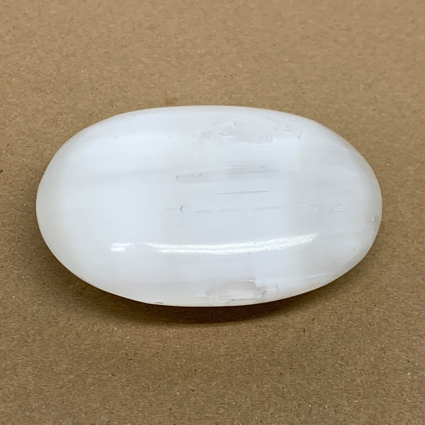 0.59 lbs, 3.9"x2.9"x1.2", White Selenite Palmstone Crystal Pillow Reiki, B36111