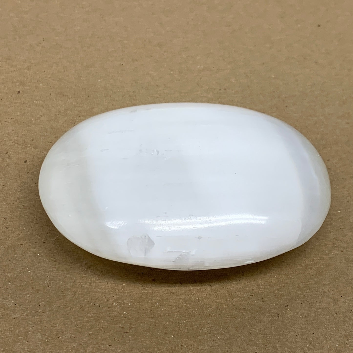 0.59 lbs, 3.9"x2.9"x1.2", White Selenite Palmstone Crystal Pillow Reiki, B36111
