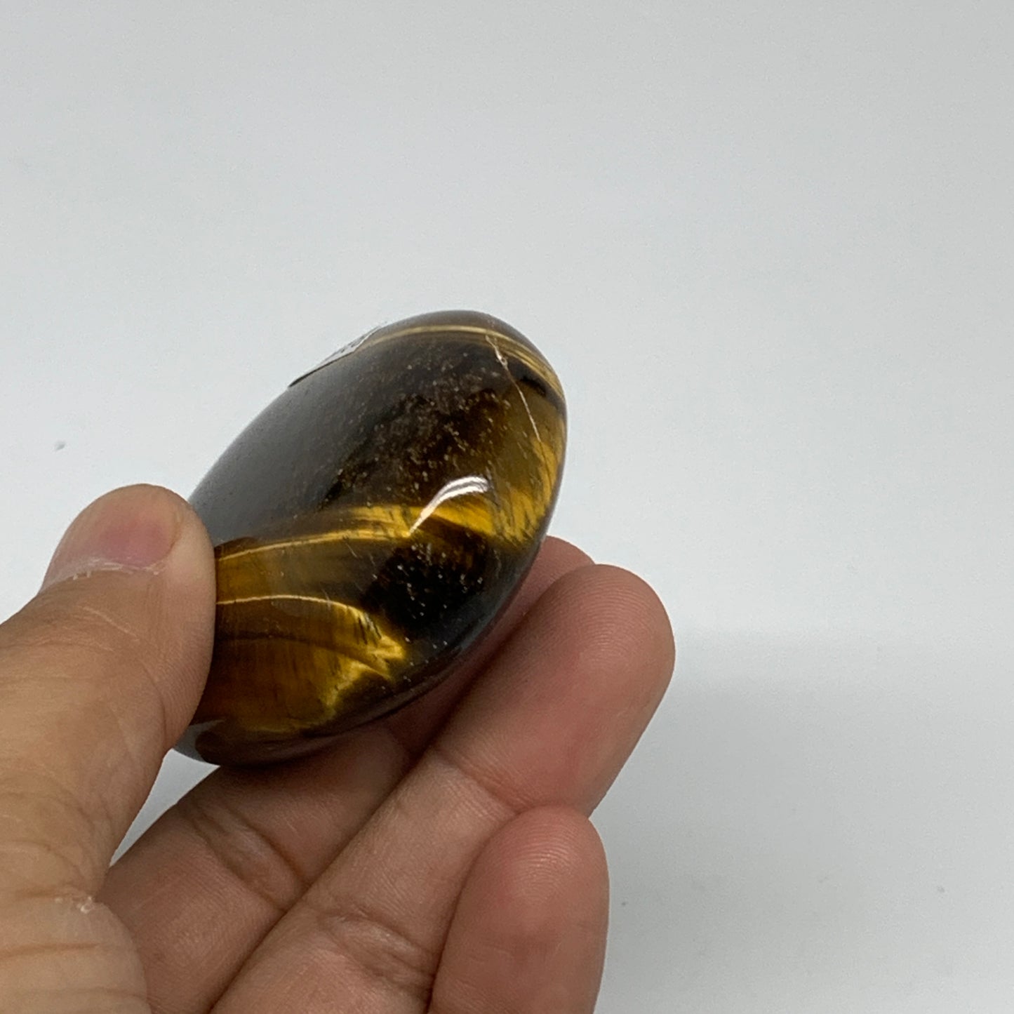 92.8g, 2.4"x1.8"x0.8", Natural Tiger's Eye Palm-Stone Polished, B34810
