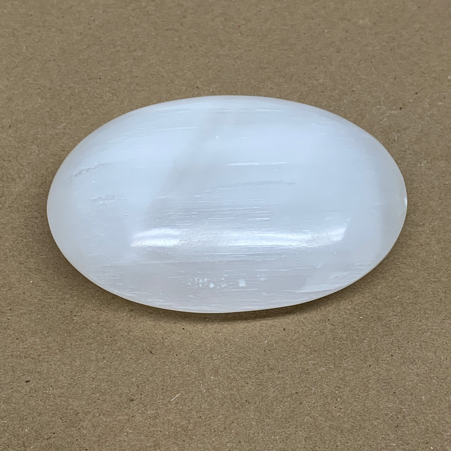 0.59 lbs, 3.9"x2.9"x1.2", White Selenite Palmstone Crystal Pillow Reiki, B36124