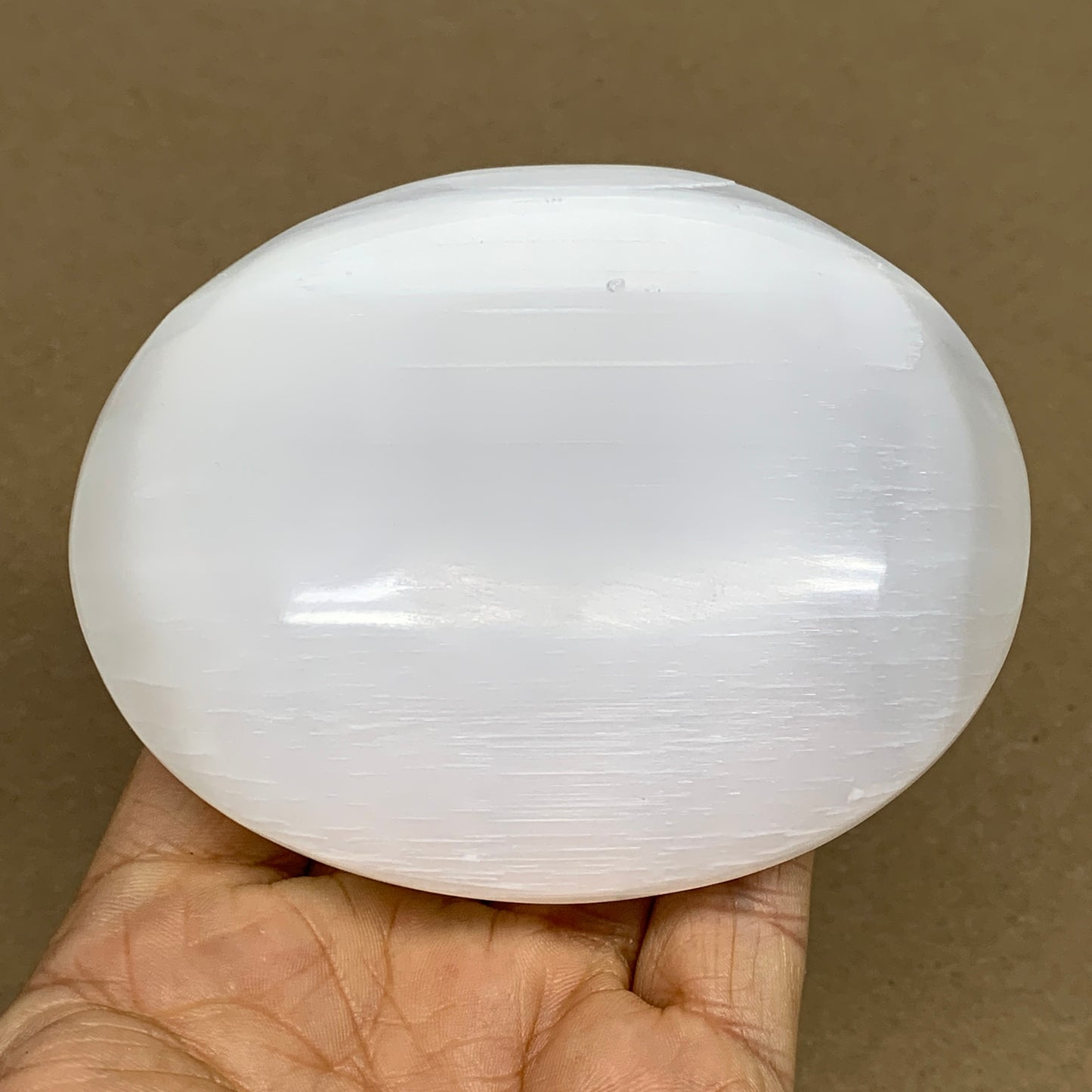 0.73 lbs, 3.9"x3.3"x1.3", White Selenite Palmstone Crystal Pillow Reiki, B36125