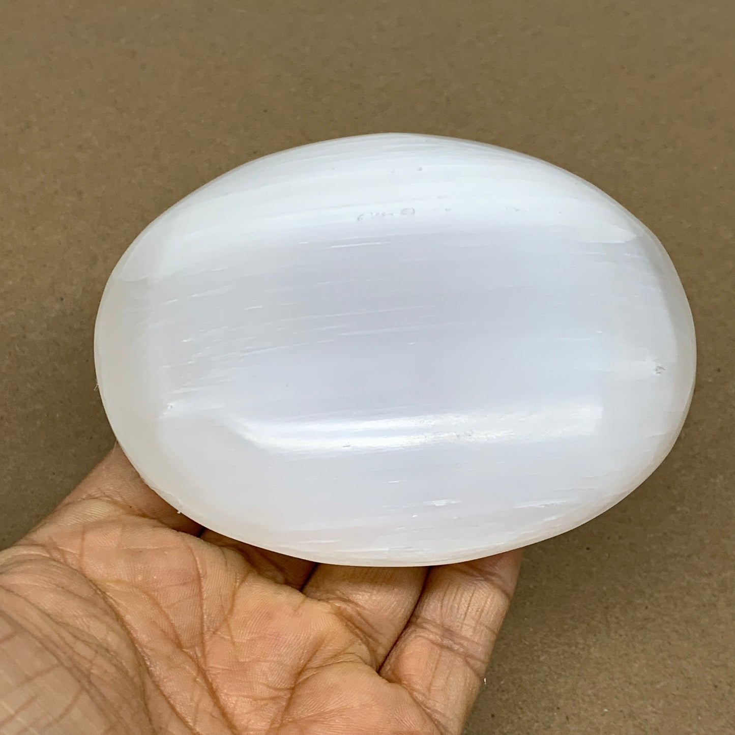 0.73 lbs, 3.9"x3.3"x1.3", White Selenite Palmstone Crystal Pillow Reiki, B36125