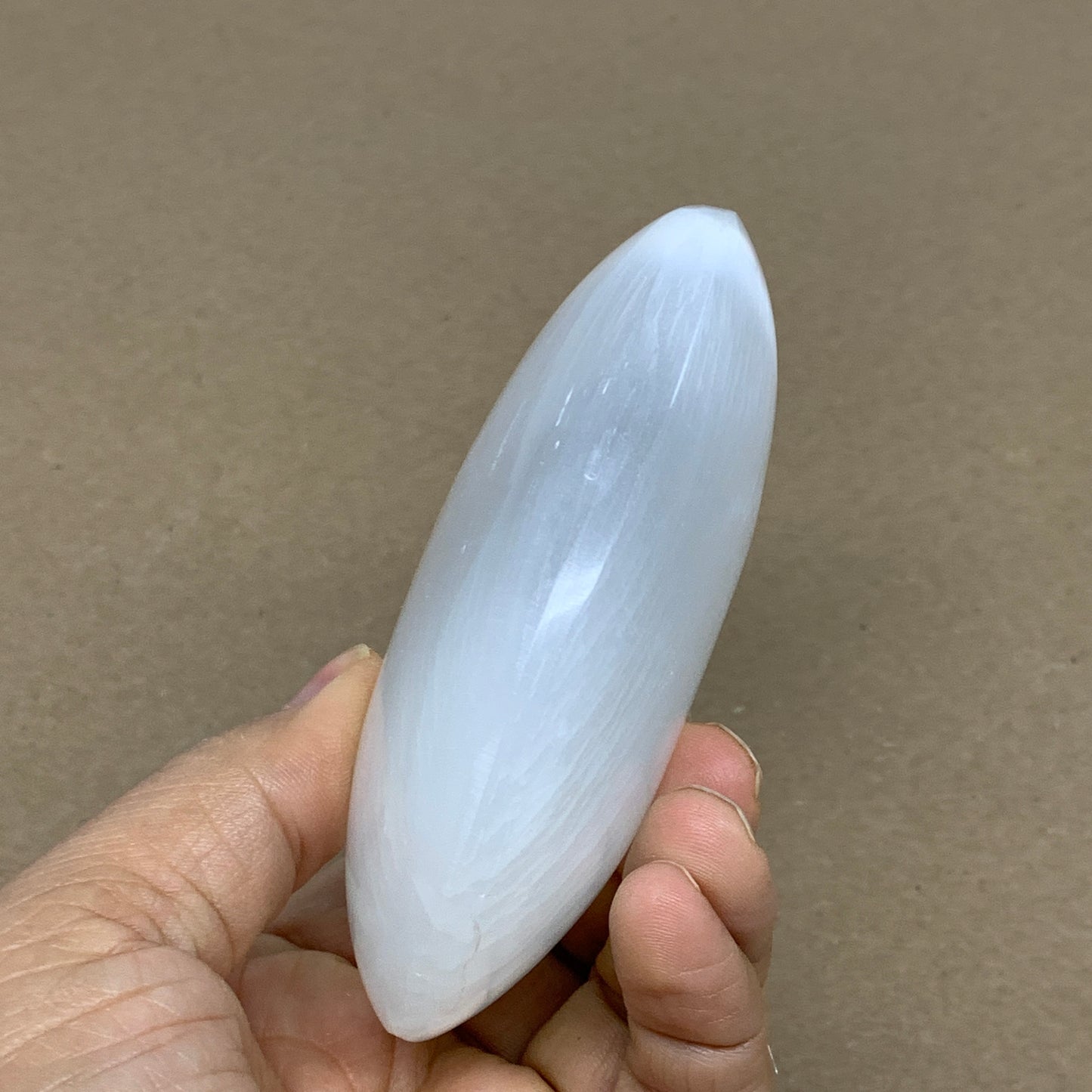 0.73 lbs, 3.9"x3.3"x1.3", White Selenite Palmstone Crystal Pillow Reiki, B36125