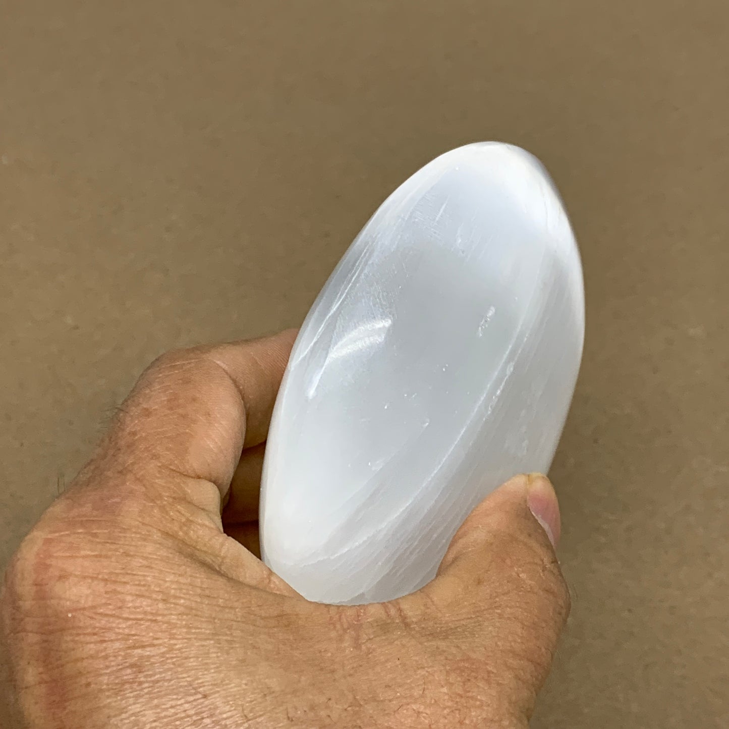 0.73 lbs, 3.9"x3.3"x1.3", White Selenite Palmstone Crystal Pillow Reiki, B36125