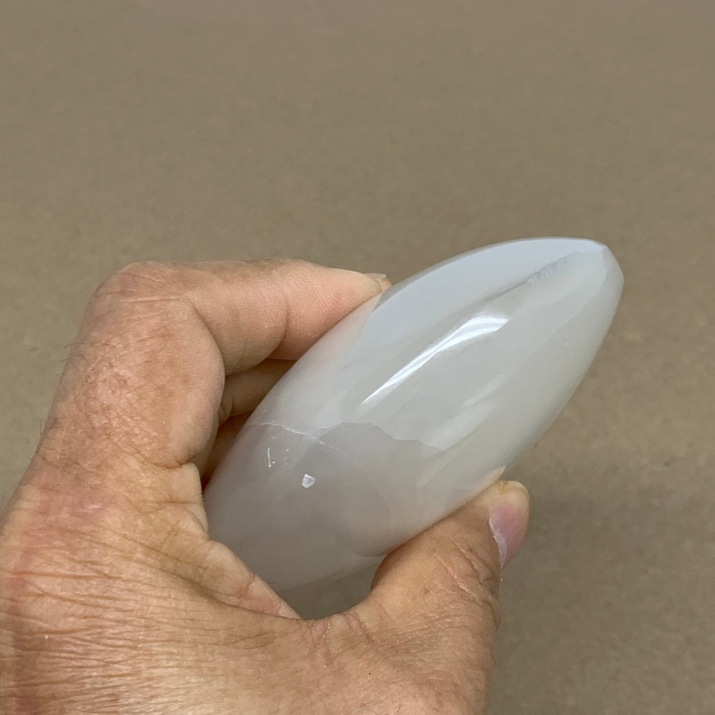 0.73 lbs, 3.9"x3.3"x1.3", White Selenite Palmstone Crystal Pillow Reiki, B36125