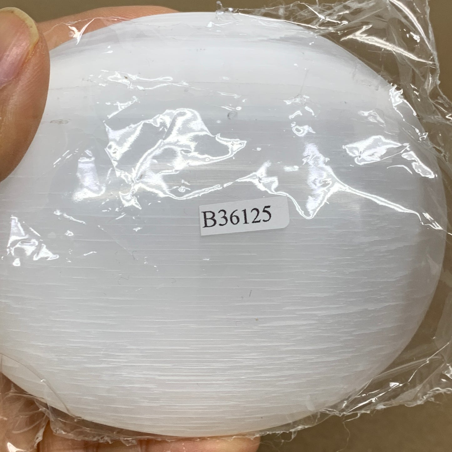 0.73 lbs, 3.9"x3.3"x1.3", White Selenite Palmstone Crystal Pillow Reiki, B36125