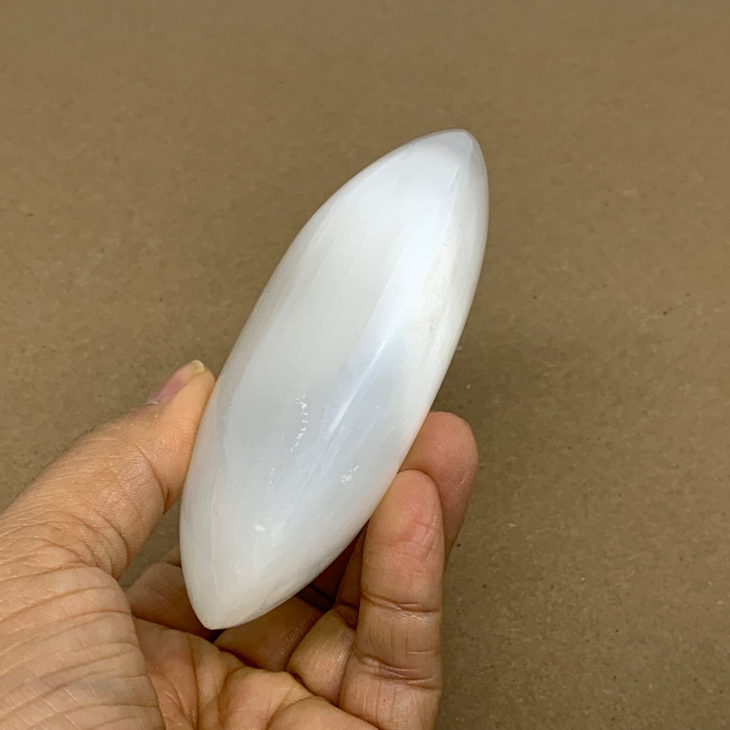 0.69 lbs, 3.9"x3.1"x1.3", White Selenite Palmstone Crystal Pillow Reiki, B36126