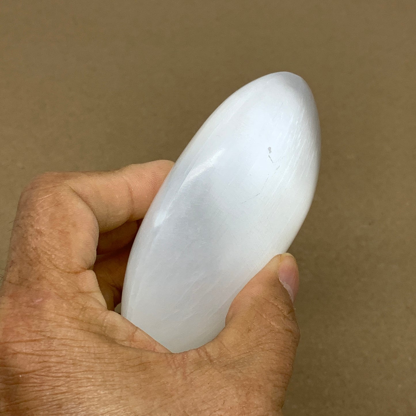 0.69 lbs, 3.9"x3.1"x1.3", White Selenite Palmstone Crystal Pillow Reiki, B36126