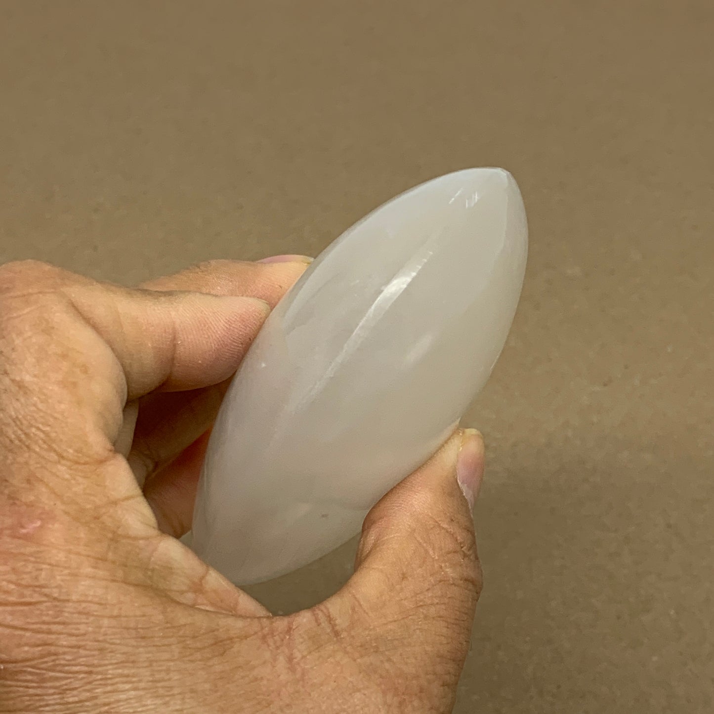 0.69 lbs, 3.9"x3.1"x1.3", White Selenite Palmstone Crystal Pillow Reiki, B36126