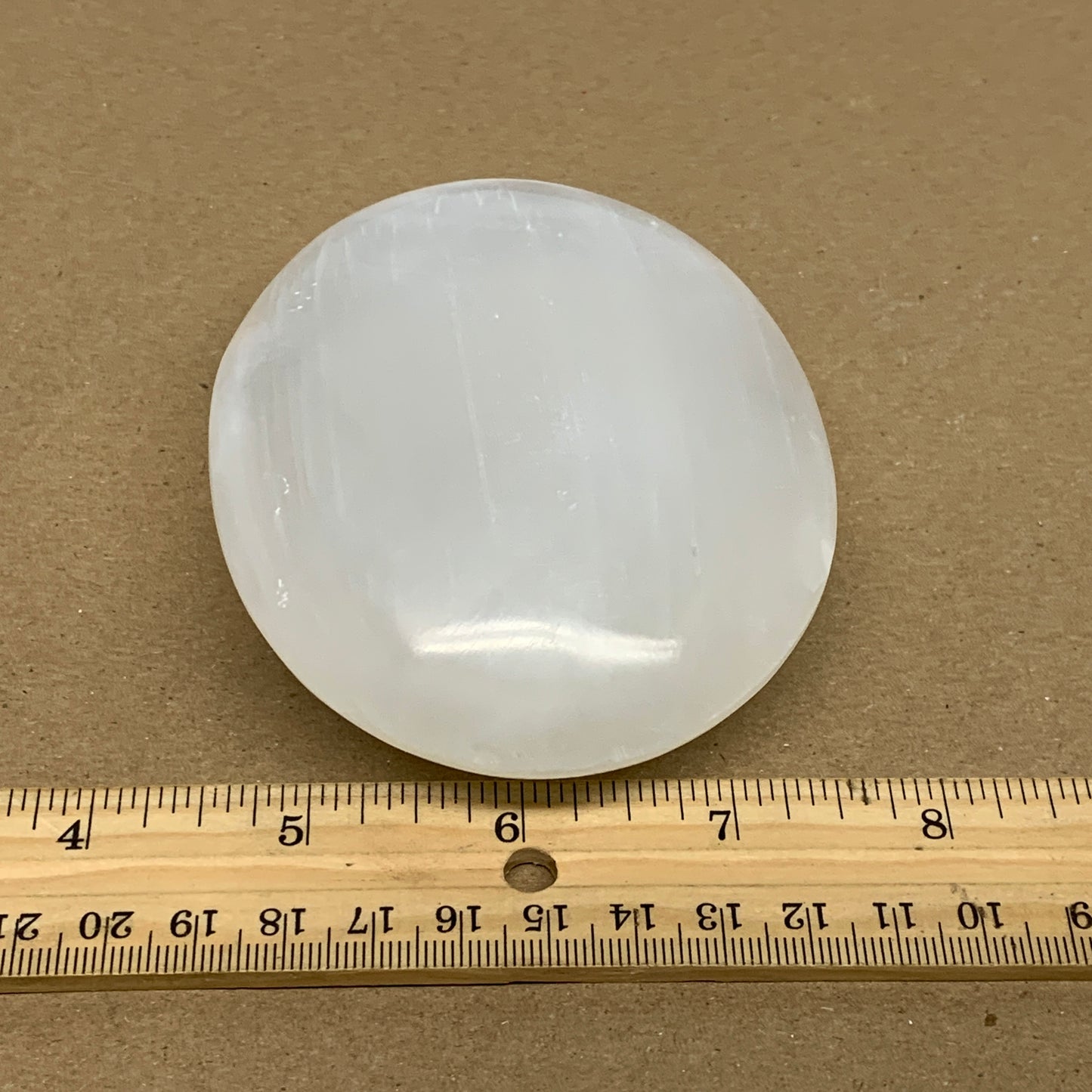 0.69 lbs, 3.9"x3.1"x1.3", White Selenite Palmstone Crystal Pillow Reiki, B36126