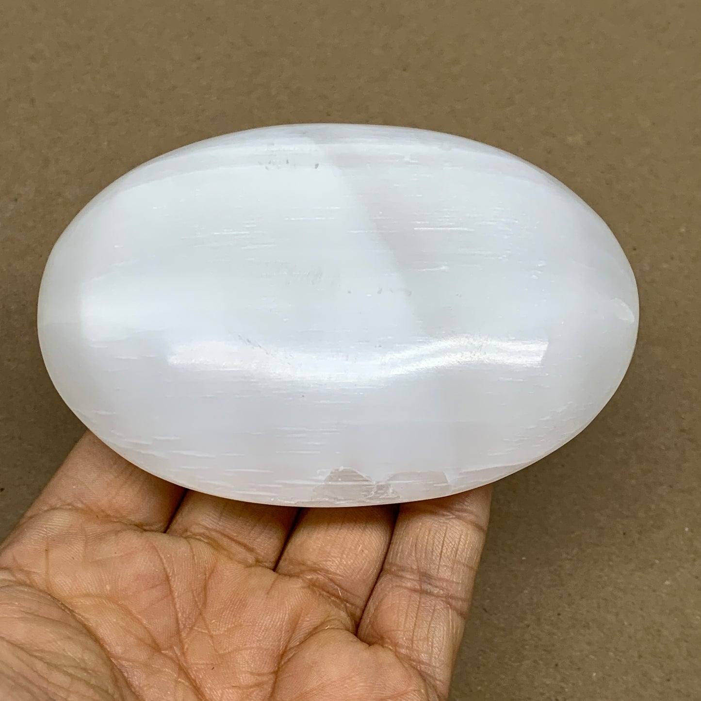 0.63 lbs, 3.9"x3"x1.2", White Selenite Palmstone Crystal Pillow Reiki, B36128