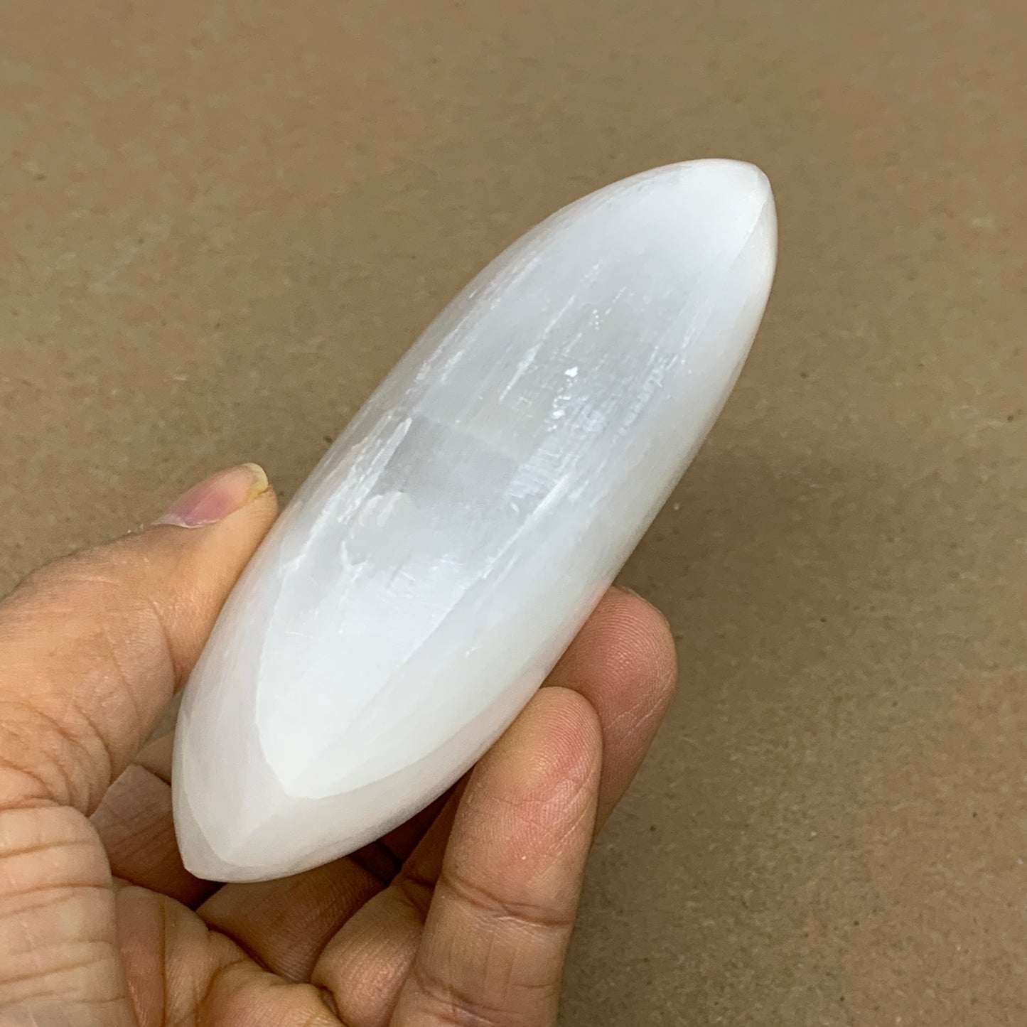 0.63 lbs, 3.9"x3"x1.2", White Selenite Palmstone Crystal Pillow Reiki, B36128