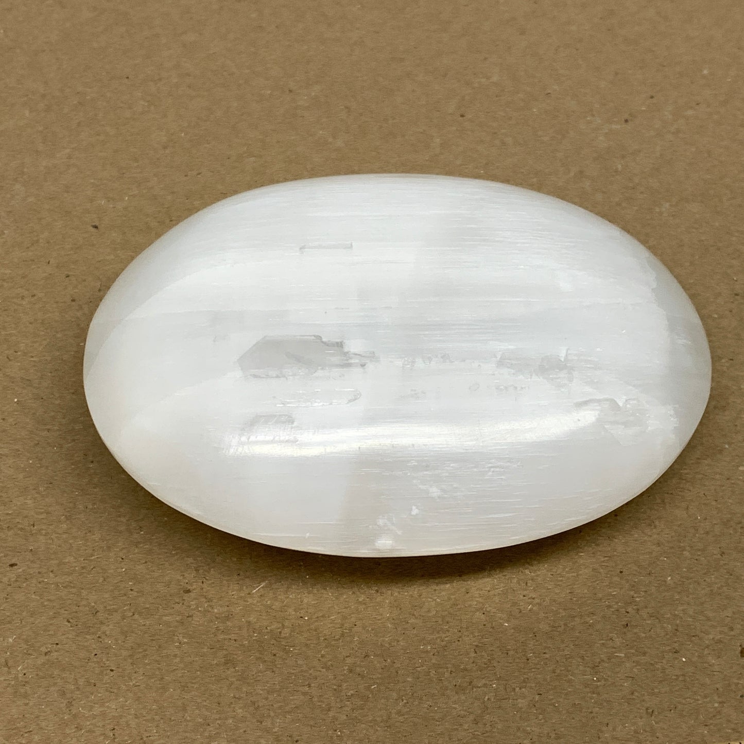 0.63 lbs, 3.9"x3"x1.2", White Selenite Palmstone Crystal Pillow Reiki, B36128