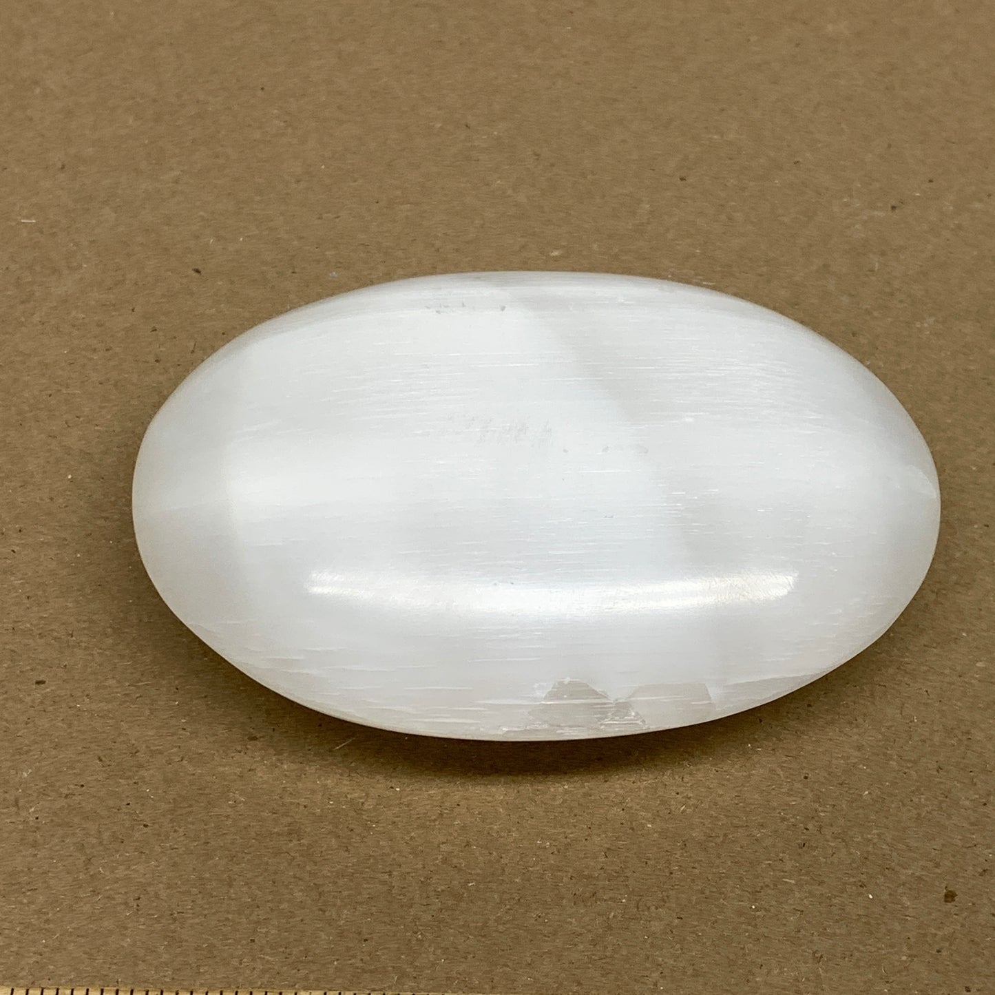 0.63 lbs, 3.9"x3"x1.2", White Selenite Palmstone Crystal Pillow Reiki, B36128