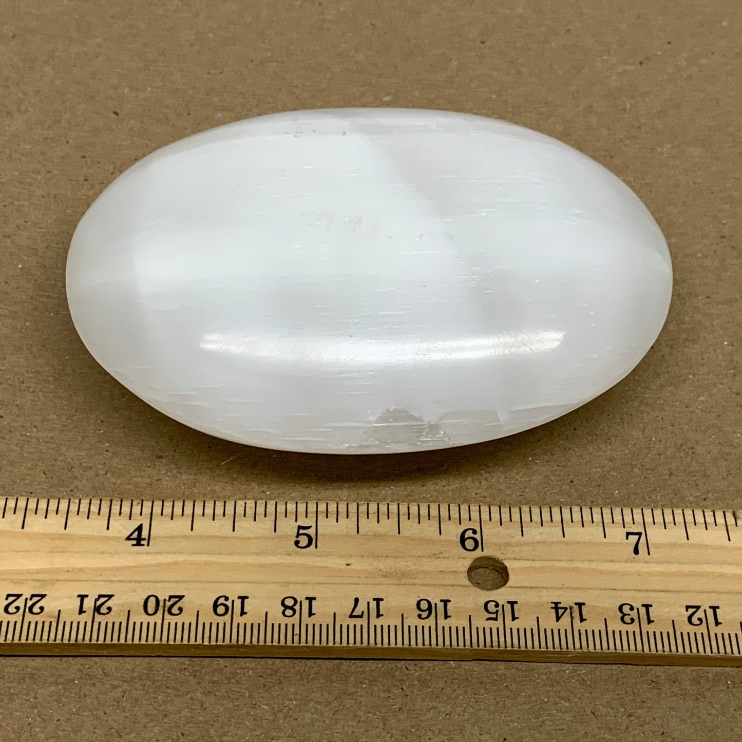 0.63 lbs, 3.9"x3"x1.2", White Selenite Palmstone Crystal Pillow Reiki, B36128