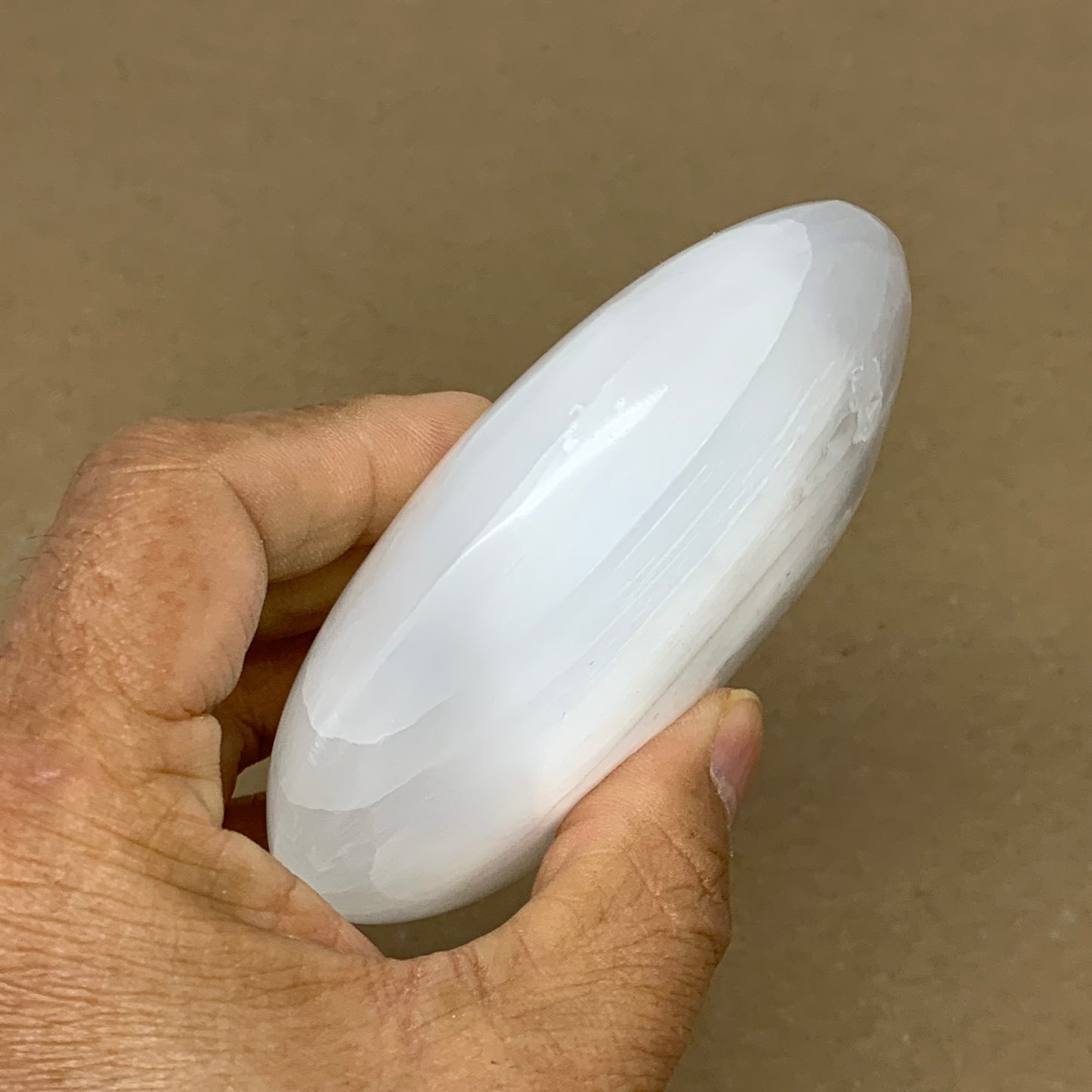 0.69 lbs, 3.8"x3"x1.3", White Selenite Palmstone Crystal Pillow Reiki, B36129