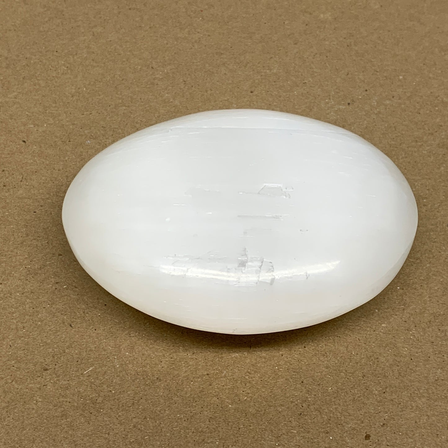 0.69 lbs, 3.8"x3"x1.3", White Selenite Palmstone Crystal Pillow Reiki, B36129