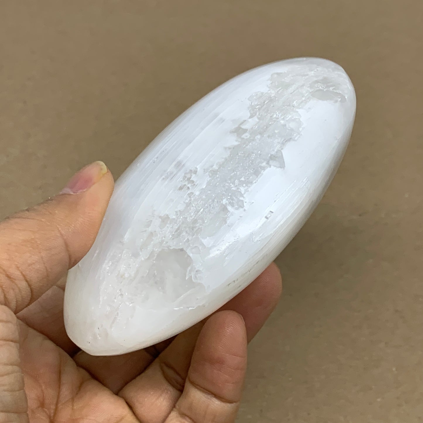 0.77 lbs, 3.9"x3.2"x1.3", White Selenite Palmstone Crystal Pillow Reiki, B36130