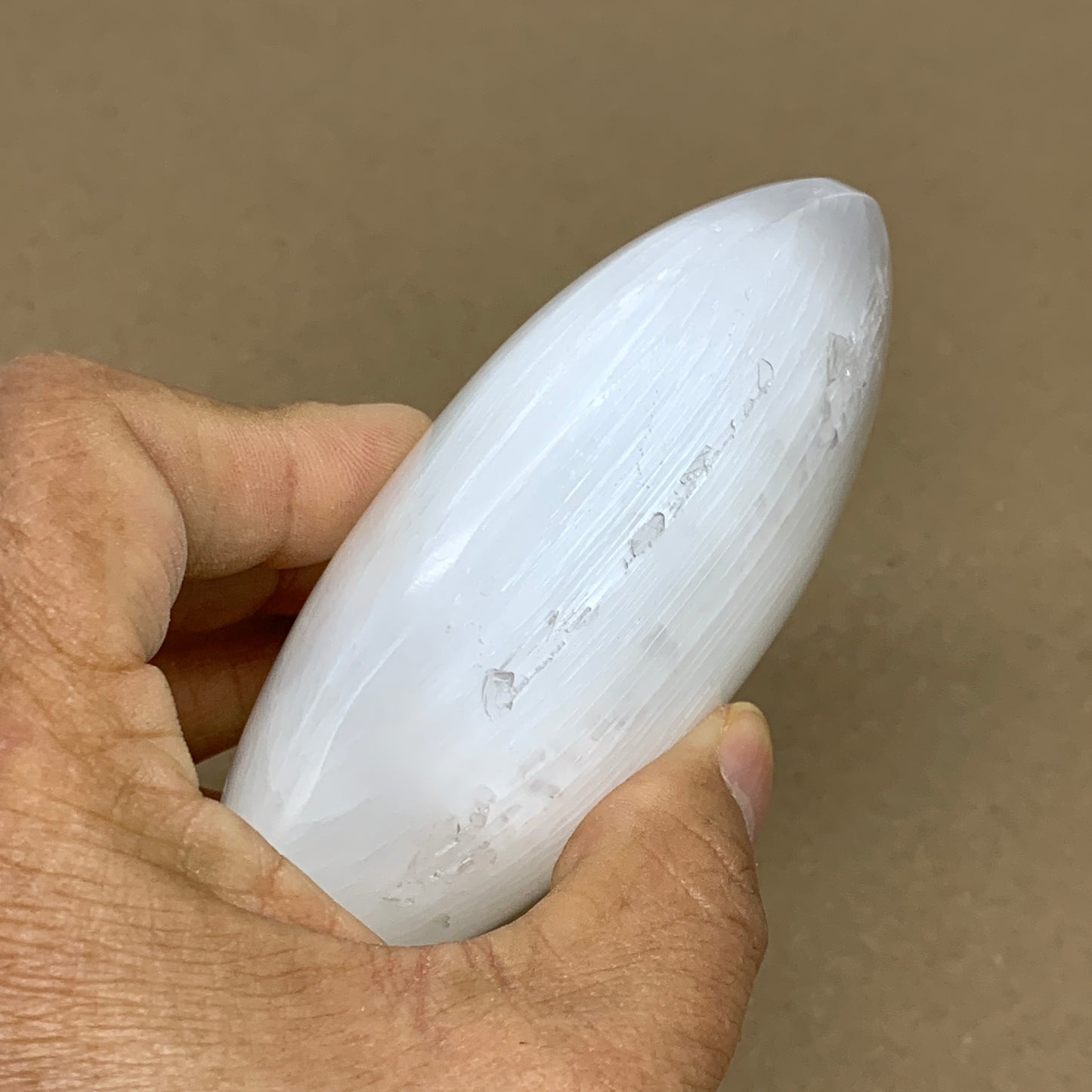 0.77 lbs, 3.9"x3.2"x1.3", White Selenite Palmstone Crystal Pillow Reiki, B36130