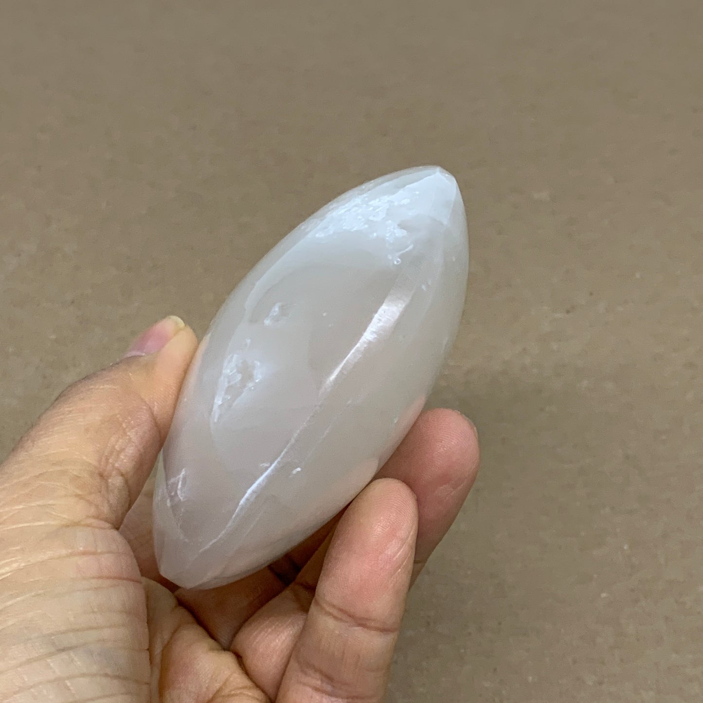 0.77 lbs, 3.9"x3.2"x1.3", White Selenite Palmstone Crystal Pillow Reiki, B36130