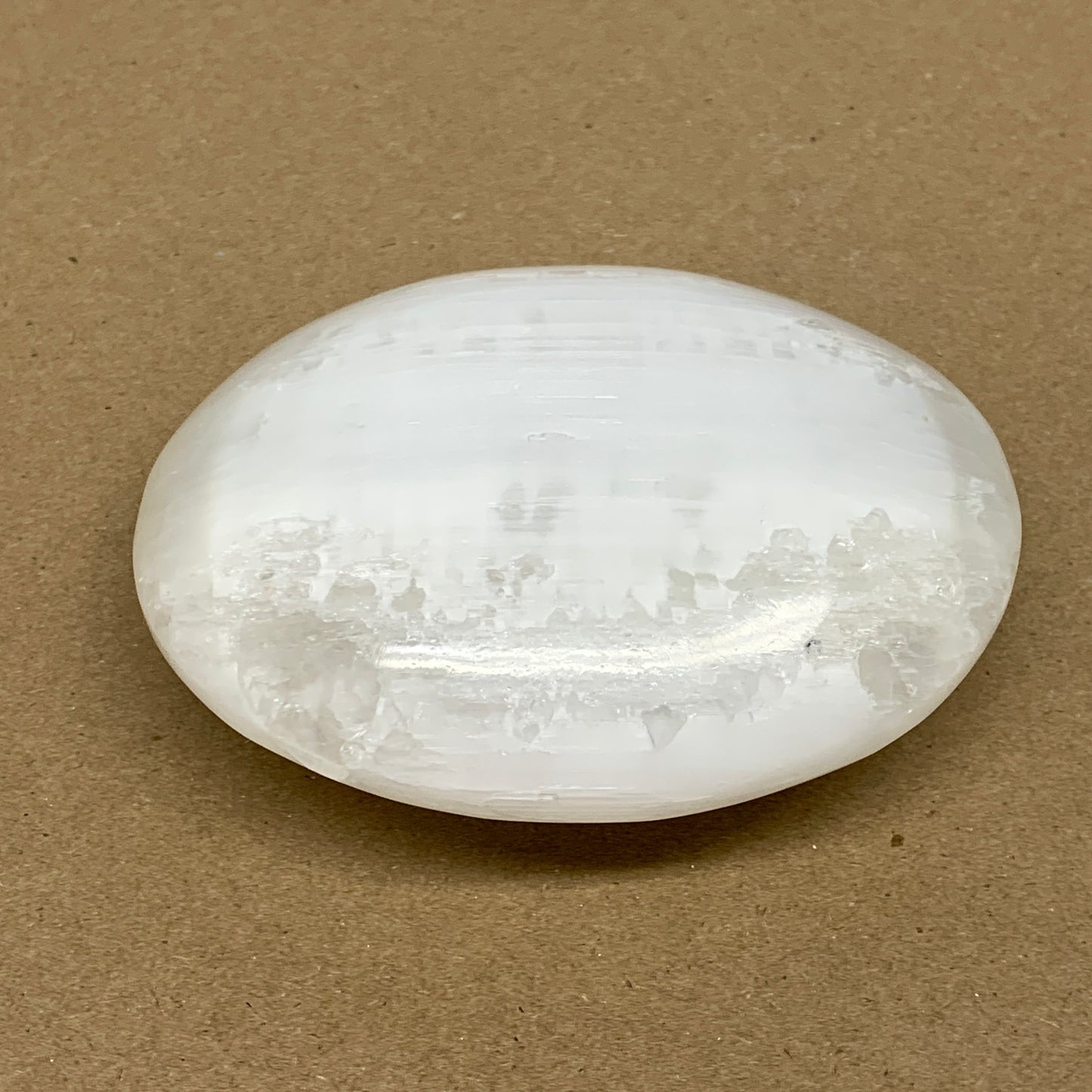 0.77 lbs, 3.9"x3.2"x1.3", White Selenite Palmstone Crystal Pillow Reiki, B36130