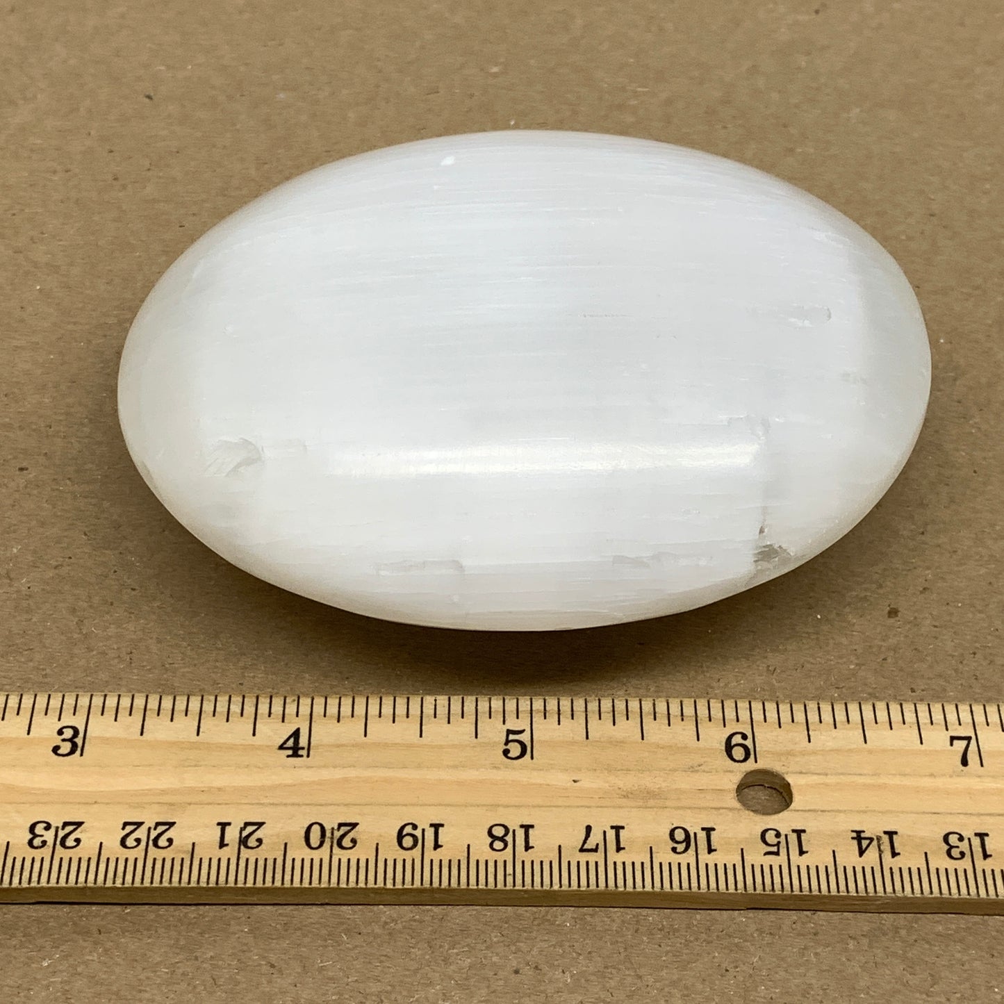 0.77 lbs, 3.9"x3.2"x1.3", White Selenite Palmstone Crystal Pillow Reiki, B36130