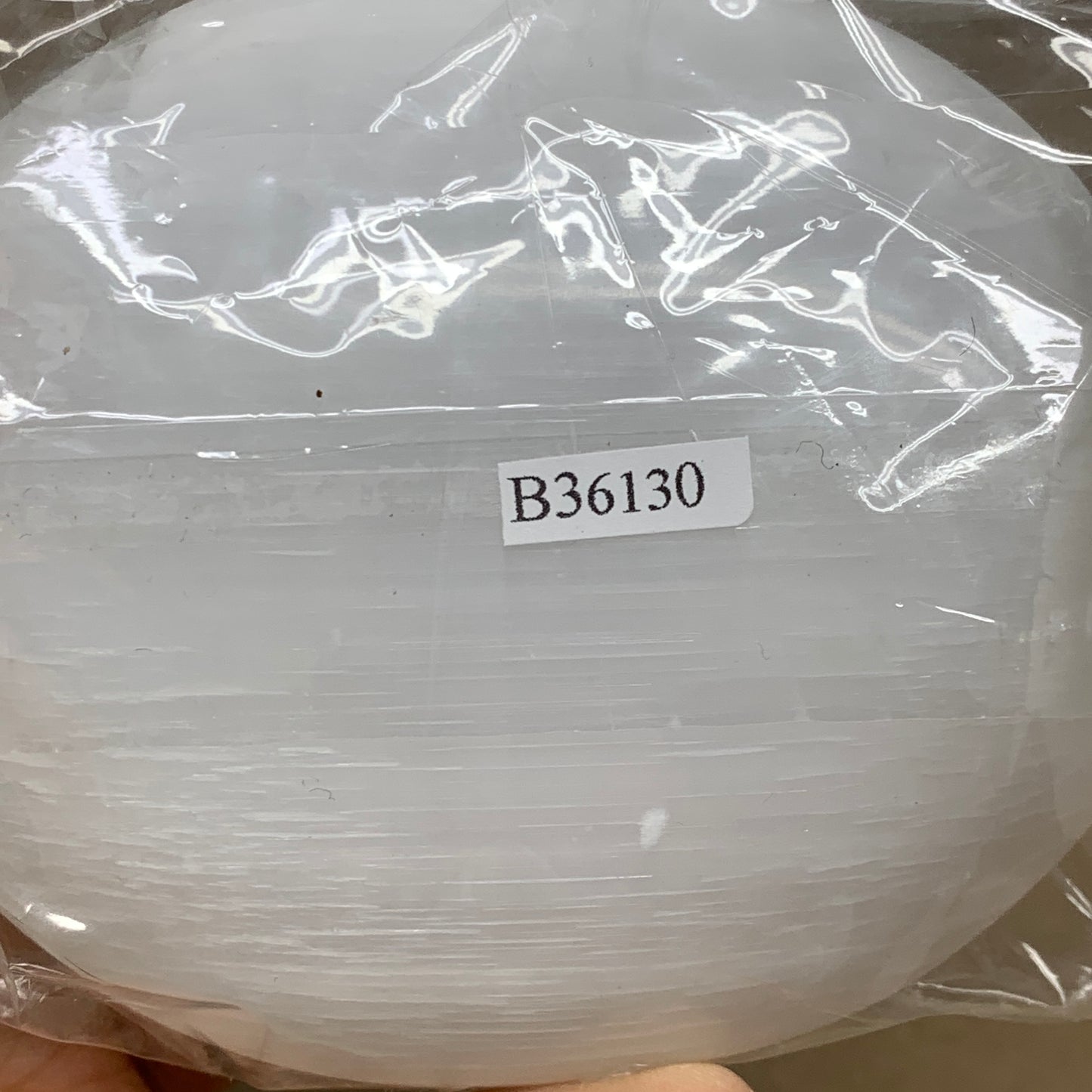 0.77 lbs, 3.9"x3.2"x1.3", White Selenite Palmstone Crystal Pillow Reiki, B36130