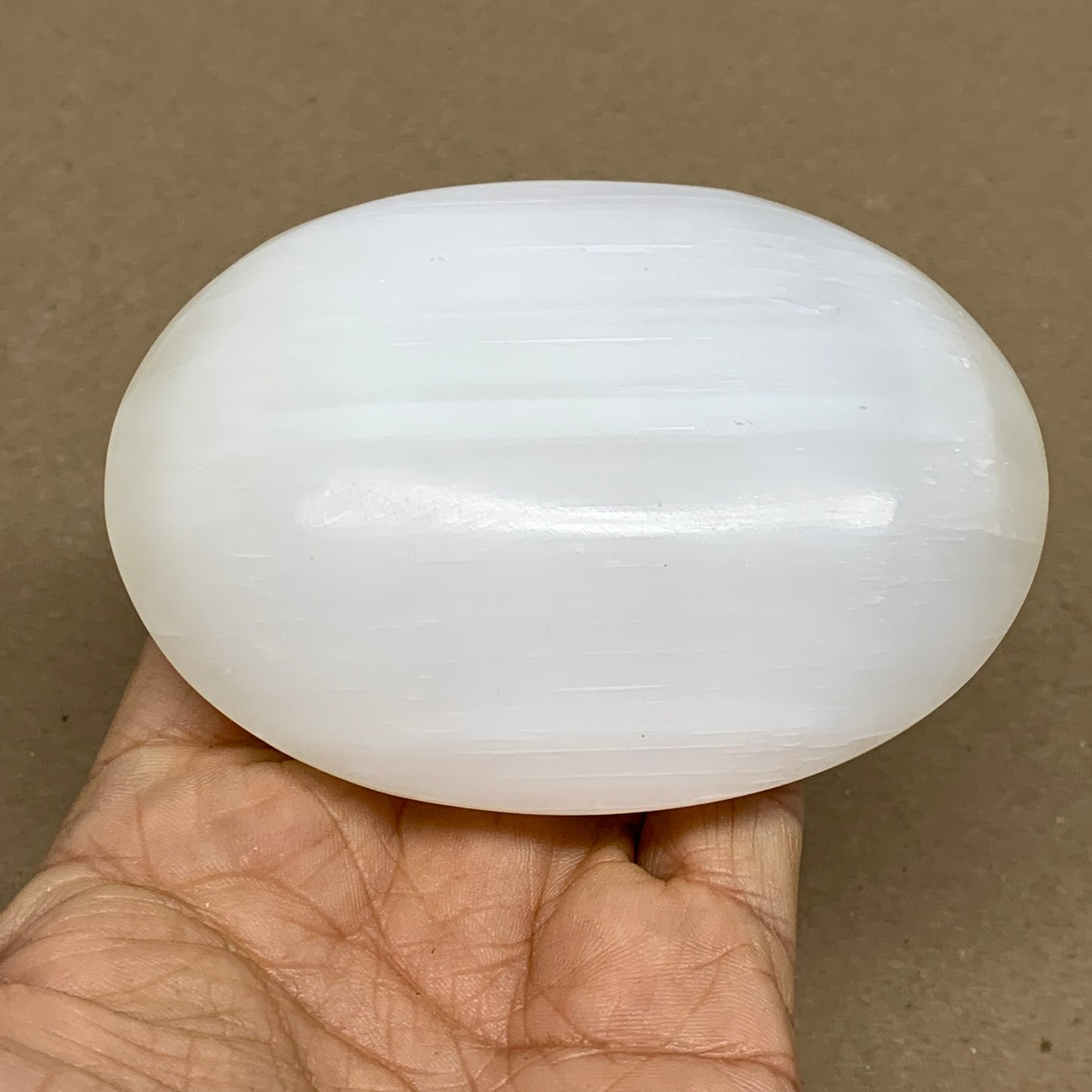 0.55 lbs, 3.8"x2.9"x1.1", White Selenite Palmstone Crystal Pillow Reiki, B36131