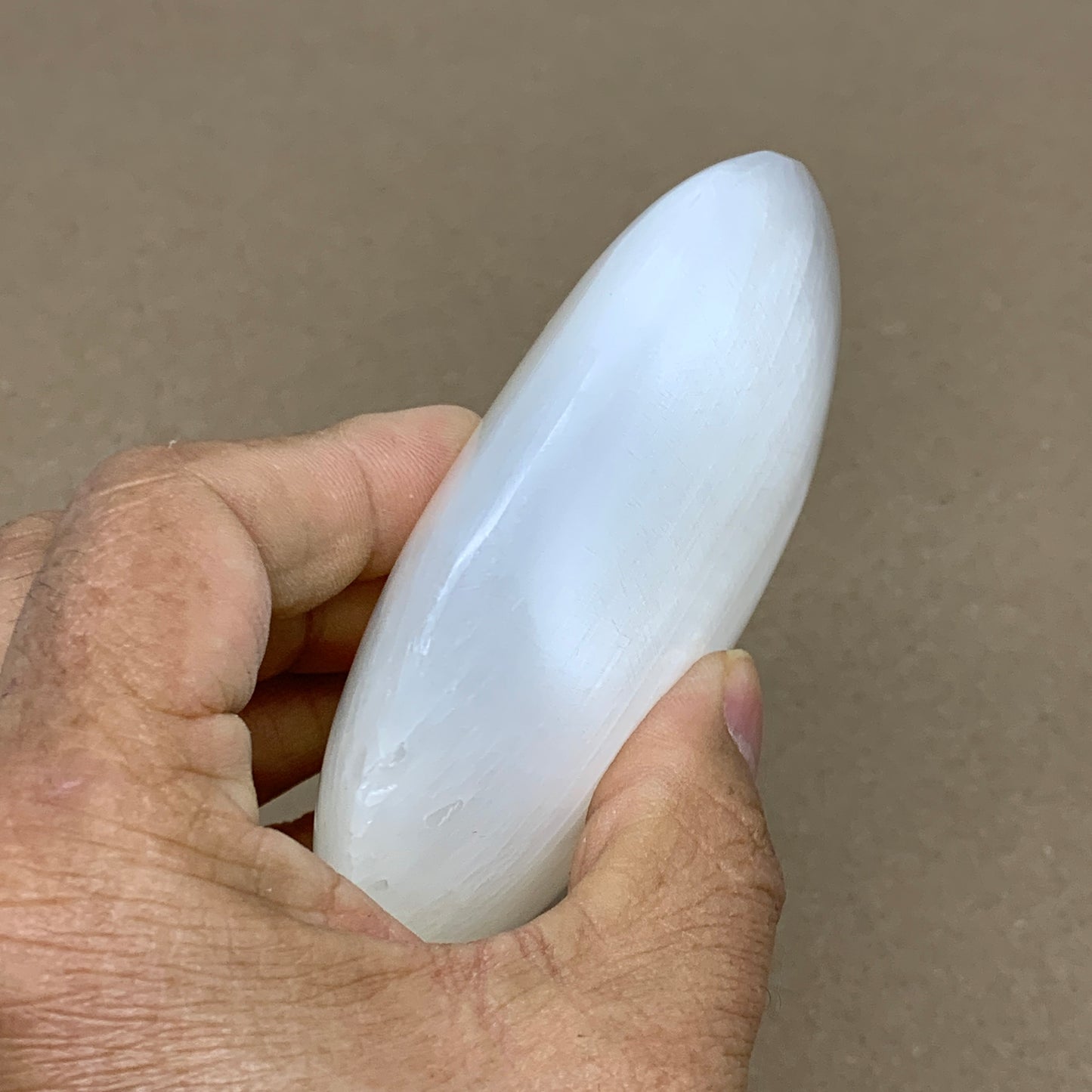 0.55 lbs, 3.8"x2.9"x1.1", White Selenite Palmstone Crystal Pillow Reiki, B36131