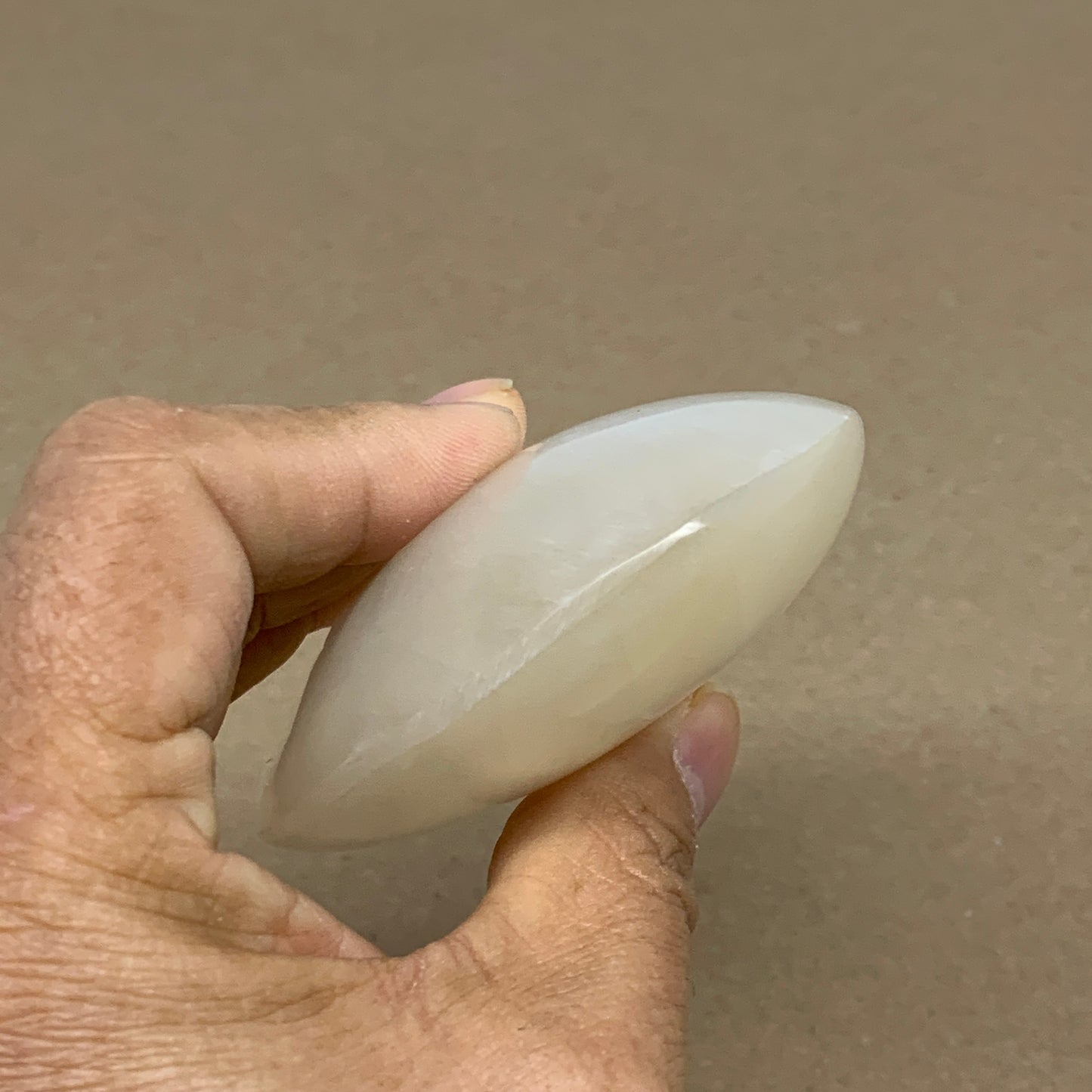 0.55 lbs, 3.8"x2.9"x1.1", White Selenite Palmstone Crystal Pillow Reiki, B36131