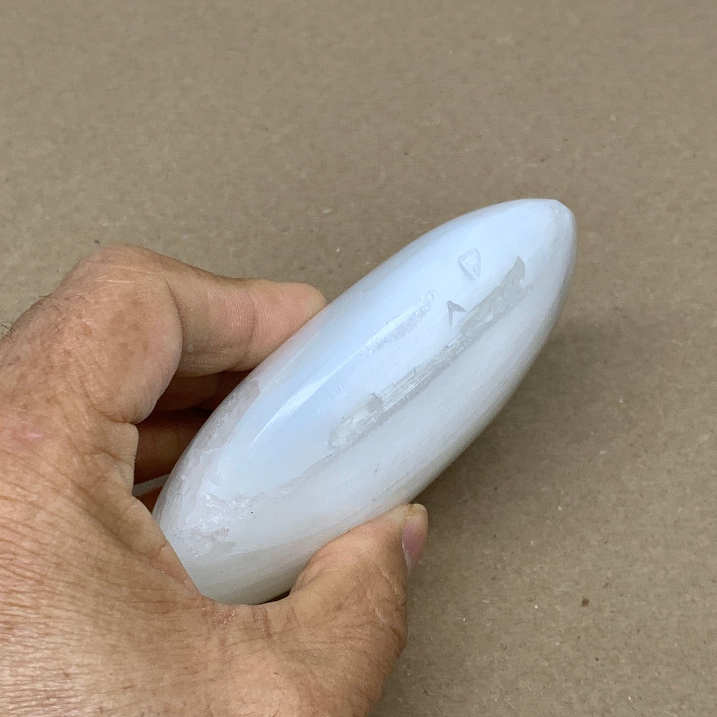 0.67 lbs, 4"x3.1"x1.3", White Selenite Palmstone Crystal Pillow Reiki, B36142