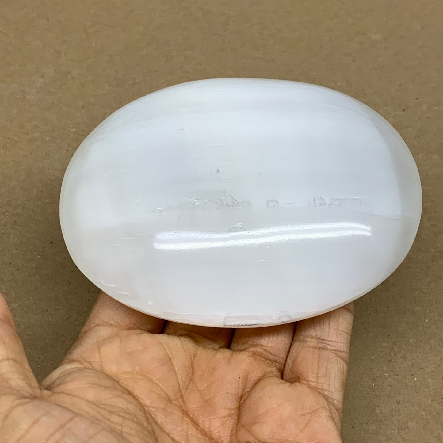 0.7 lbs, 4"x3.2"x1.3", White Selenite Palmstone Crystal Pillow Reiki, B36143