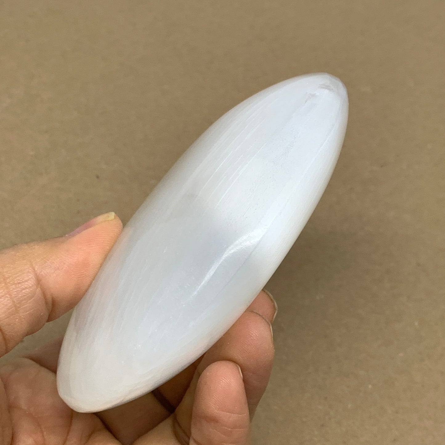 0.7 lbs, 4"x3.2"x1.3", White Selenite Palmstone Crystal Pillow Reiki, B36143