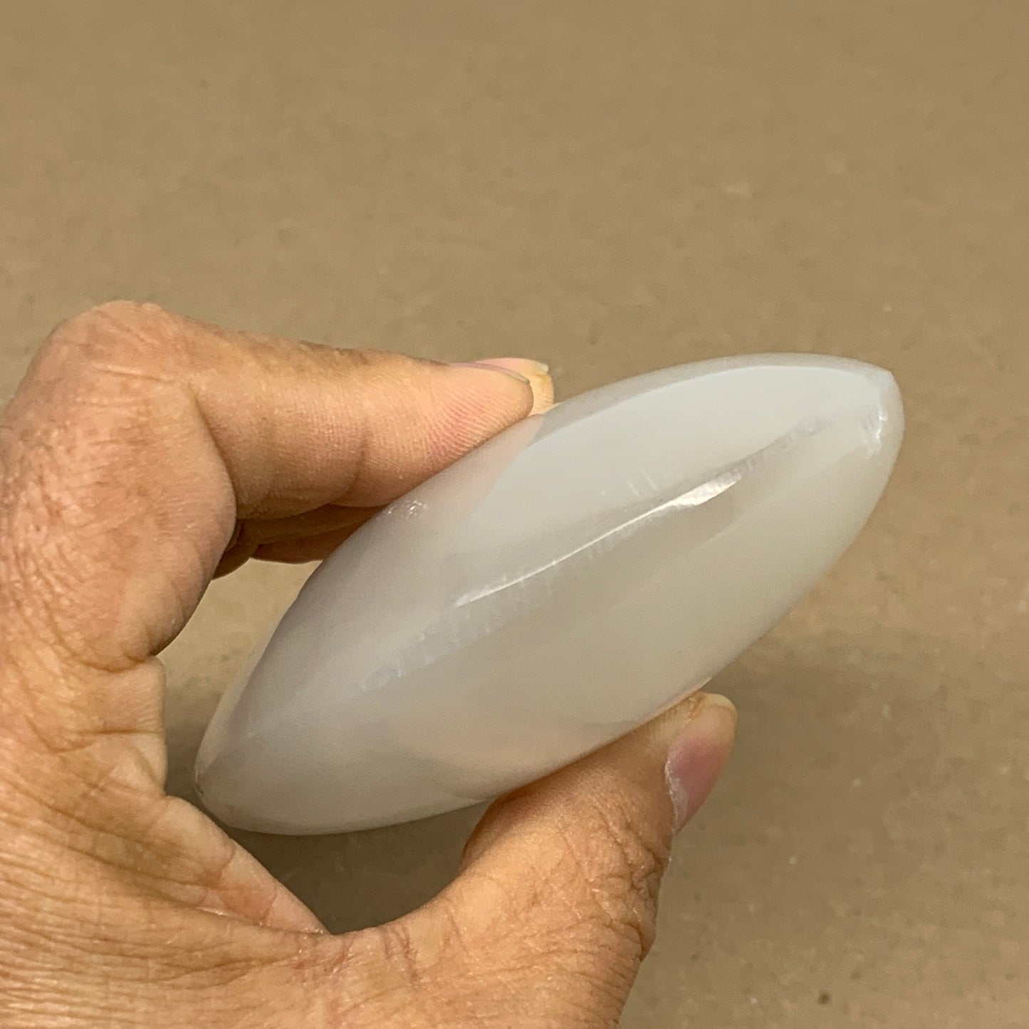 0.7 lbs, 4"x3.2"x1.3", White Selenite Palmstone Crystal Pillow Reiki, B36143