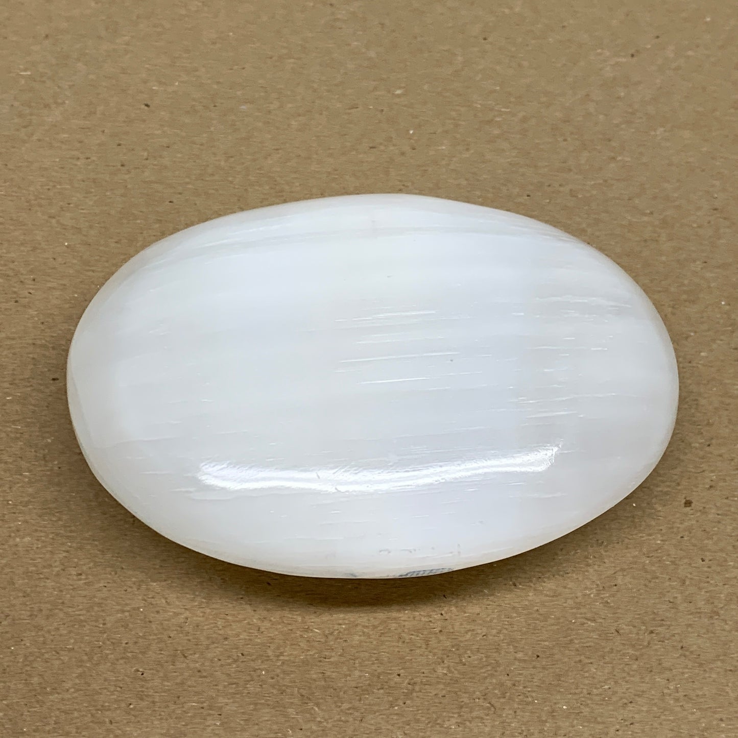 0.7 lbs, 4"x3.2"x1.3", White Selenite Palmstone Crystal Pillow Reiki, B36143