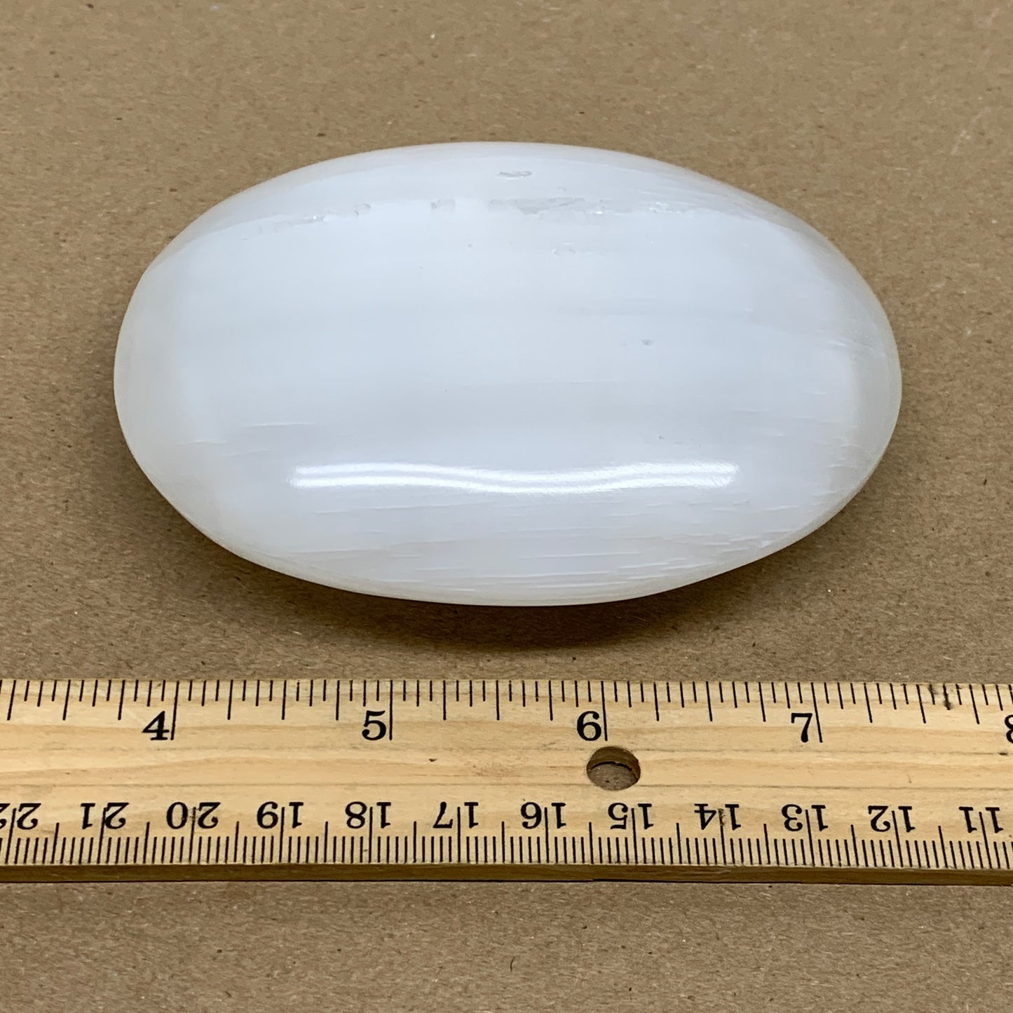 0.7 lbs, 4"x3.2"x1.3", White Selenite Palmstone Crystal Pillow Reiki, B36143