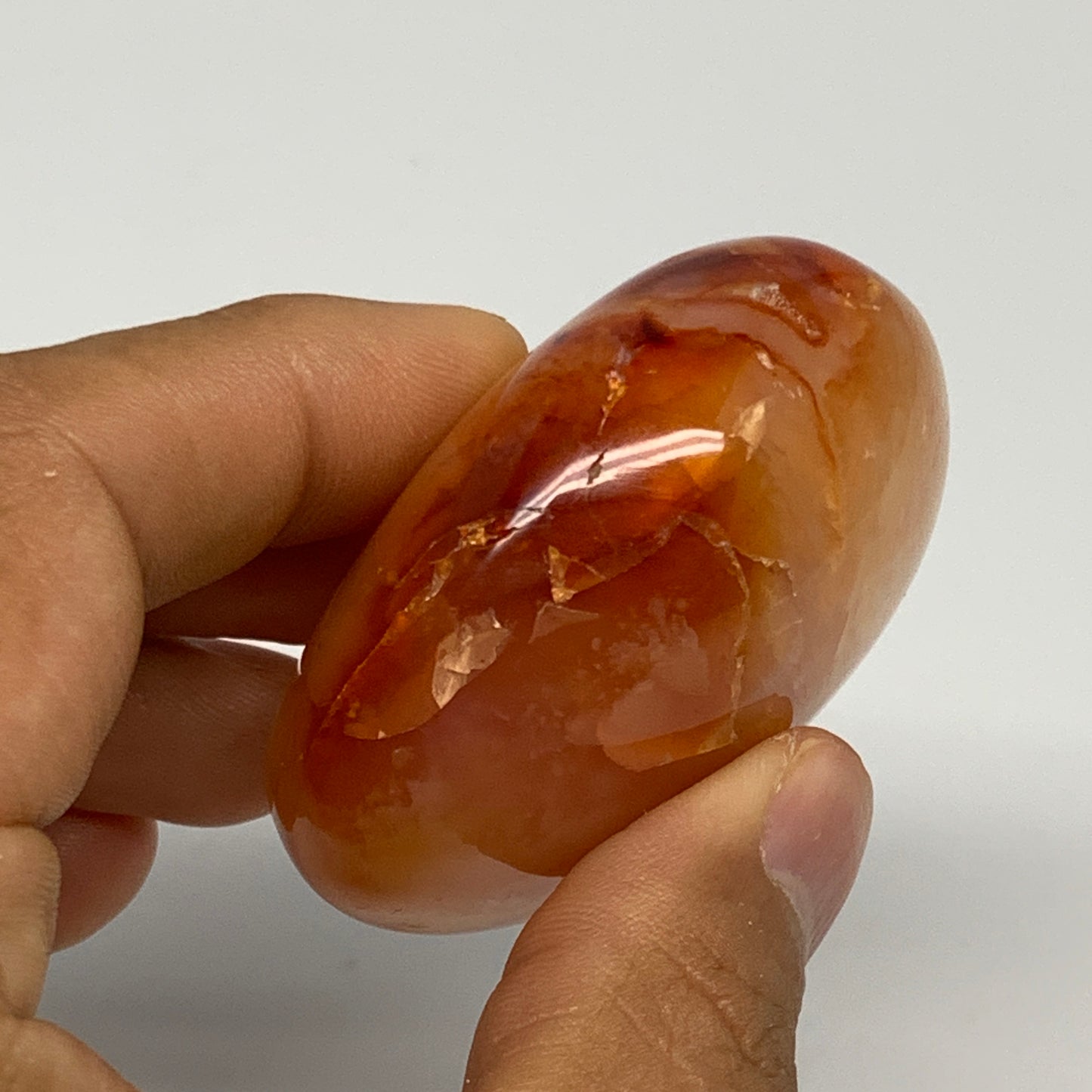 114.7g, 2.1"x2"x1.3", Red Carnelian Palm-Stone Gem Crystal Polished, B28433