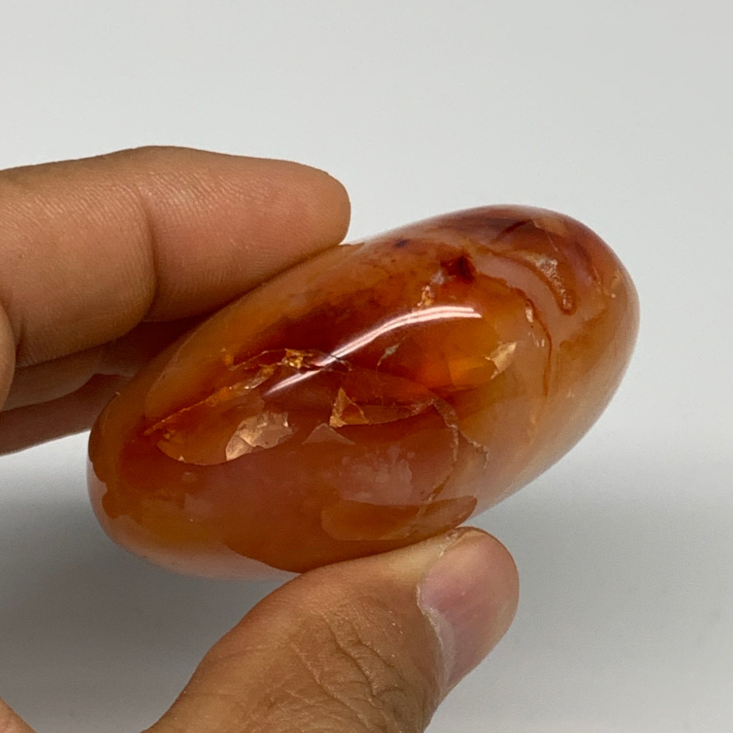 114.7g, 2.1"x2"x1.3", Red Carnelian Palm-Stone Gem Crystal Polished, B28433