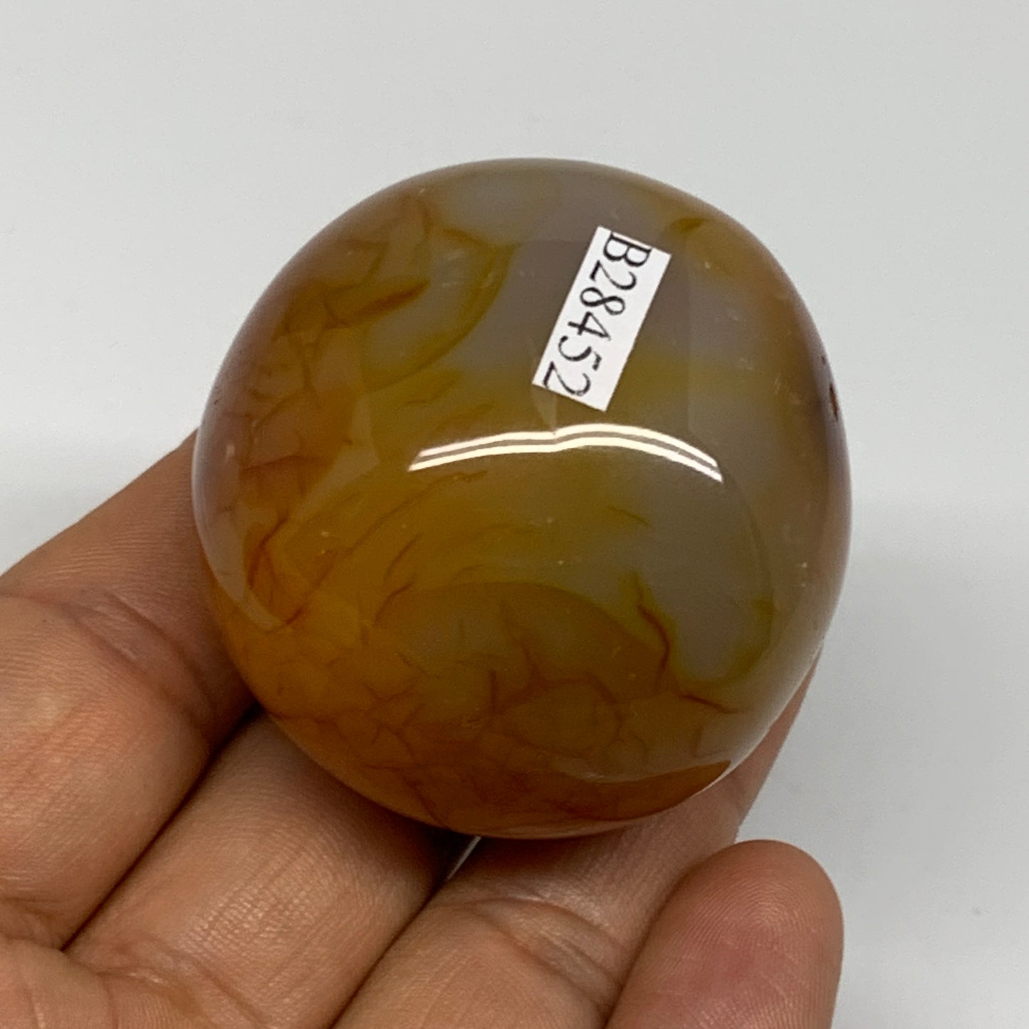 110.4g, 1.8"x1.8"x1.4", Red Carnelian Palm-Stone Gem Crystal Polished, B28452