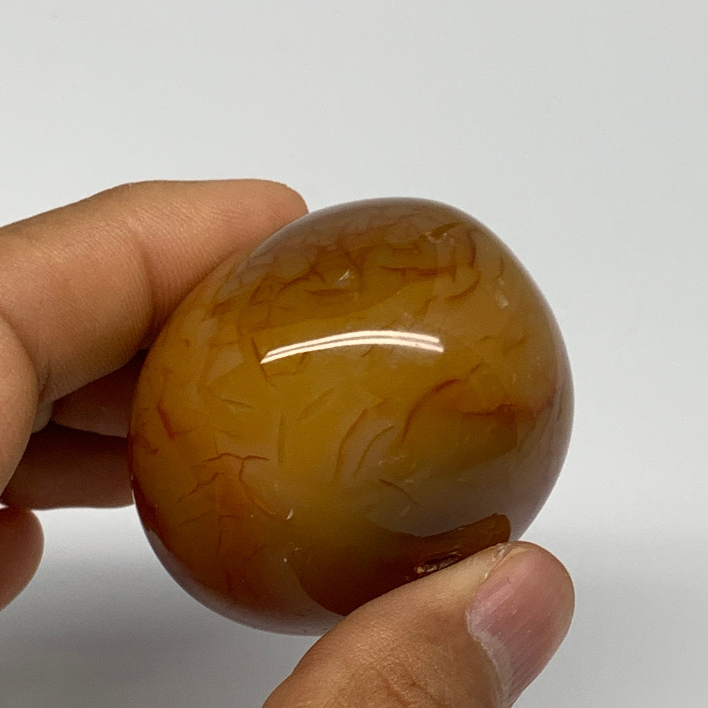 110.4g, 1.8"x1.8"x1.4", Red Carnelian Palm-Stone Gem Crystal Polished, B28452