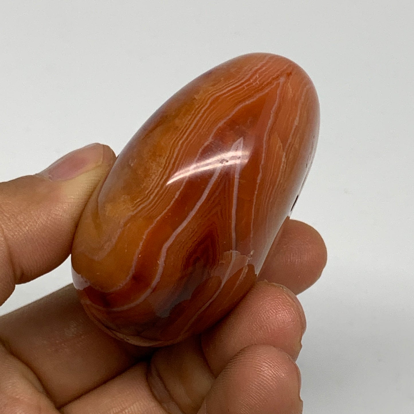 113.7g, 2.2"x1.8"x1.2", Red Carnelian Palm-Stone Gem Crystal Polished, B28453