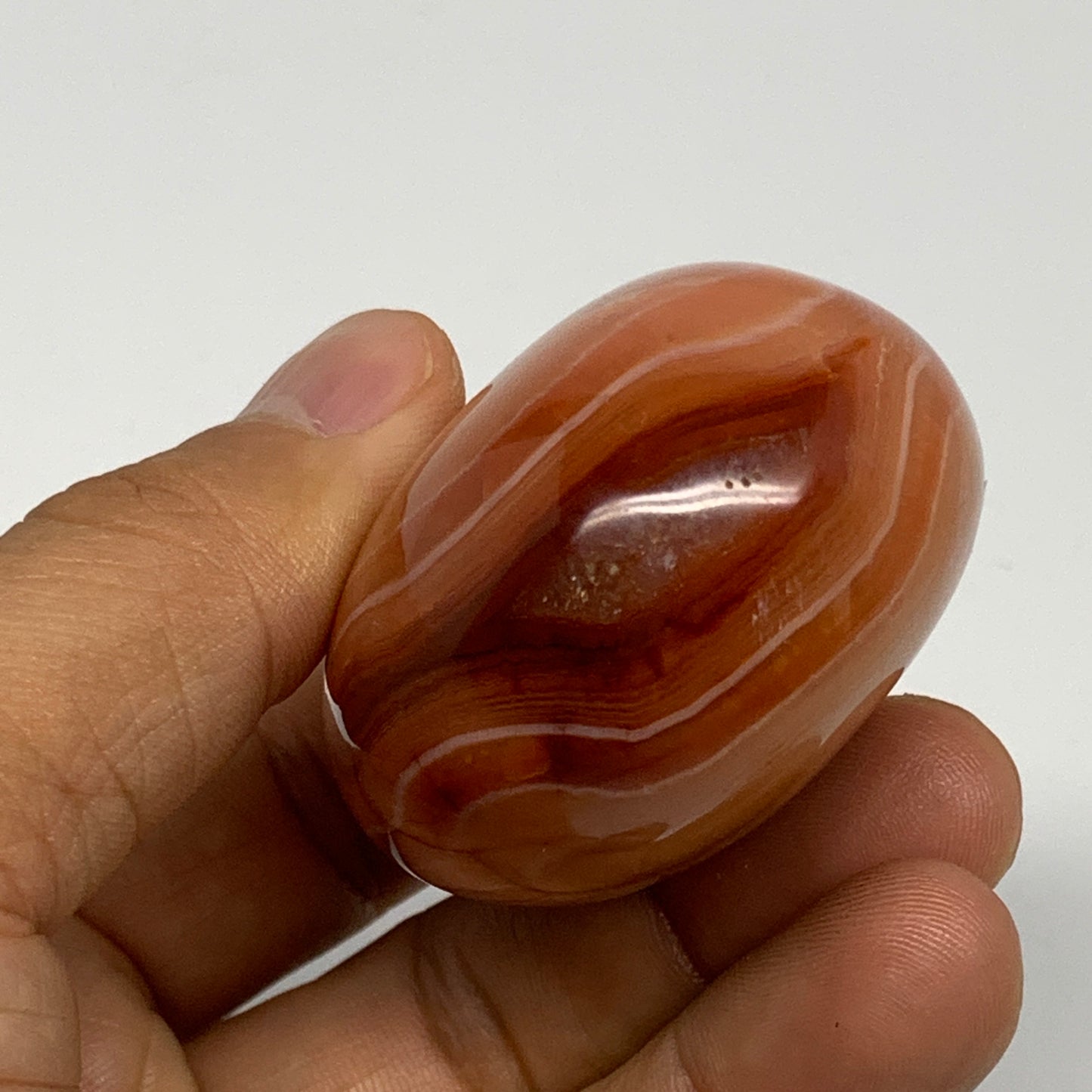 113.7g, 2.2"x1.8"x1.2", Red Carnelian Palm-Stone Gem Crystal Polished, B28453