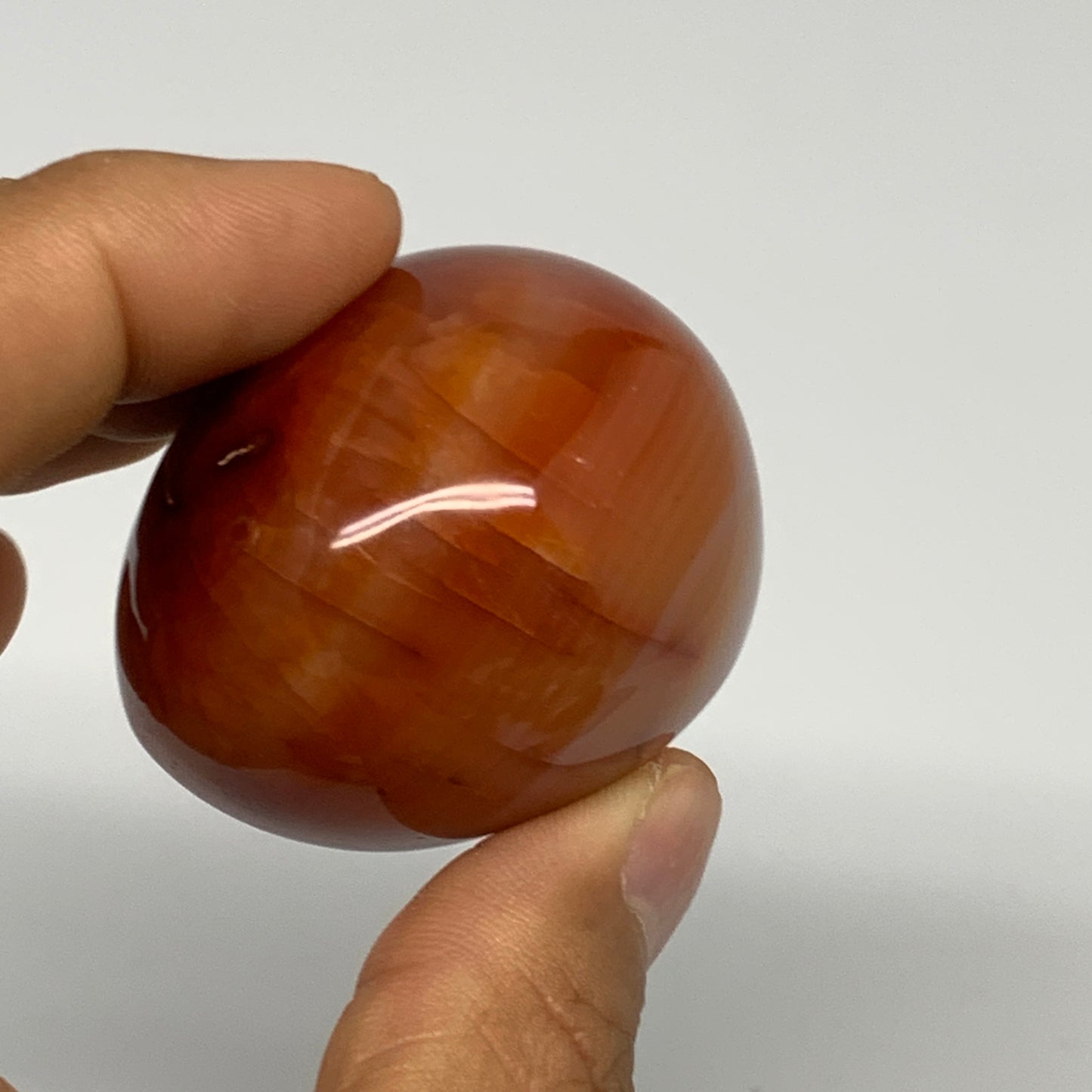 110.3g, 1.9"x1.8"x1.5", Red Carnelian Palm-Stone Gem Crystal Polished, B28456