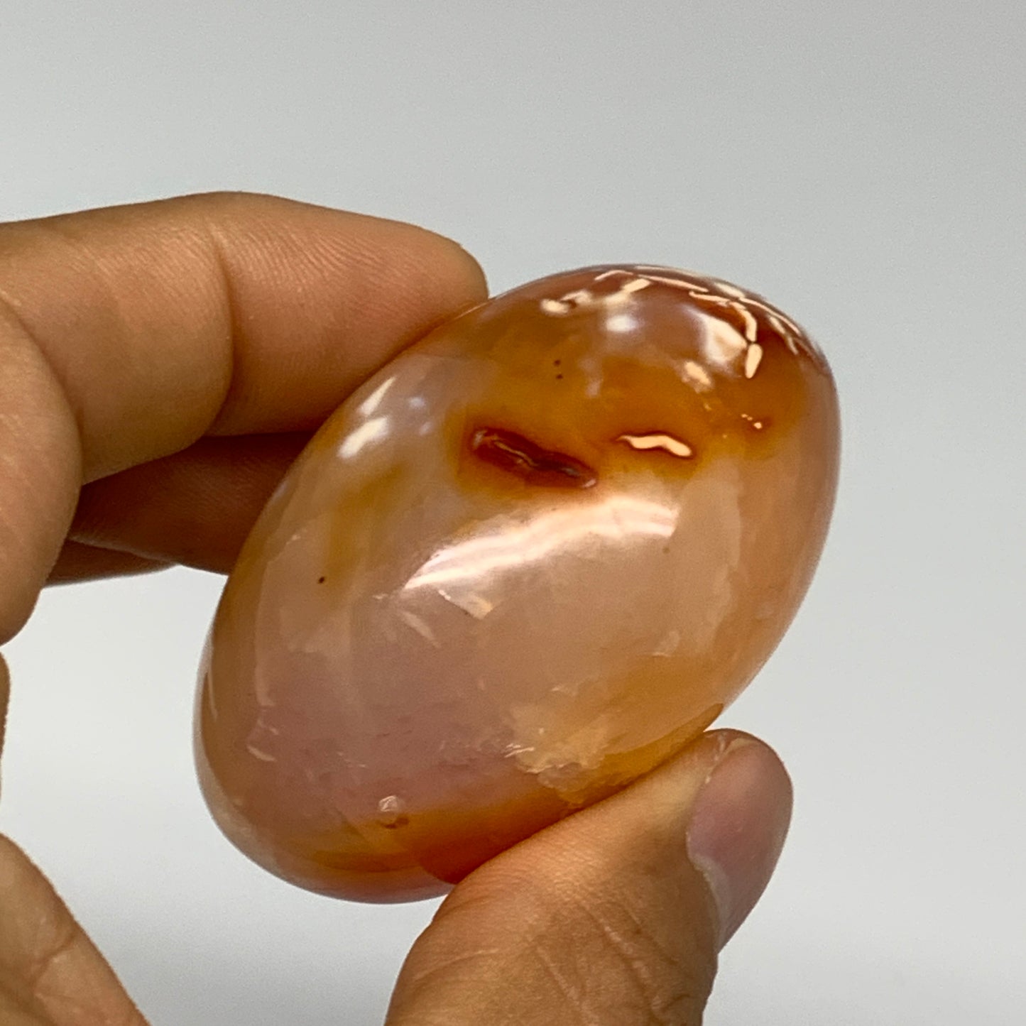 102.7g, 2.1"x1.7"x0.3", Red Carnelian Palm-Stone Gem Crystal Polished, B28461